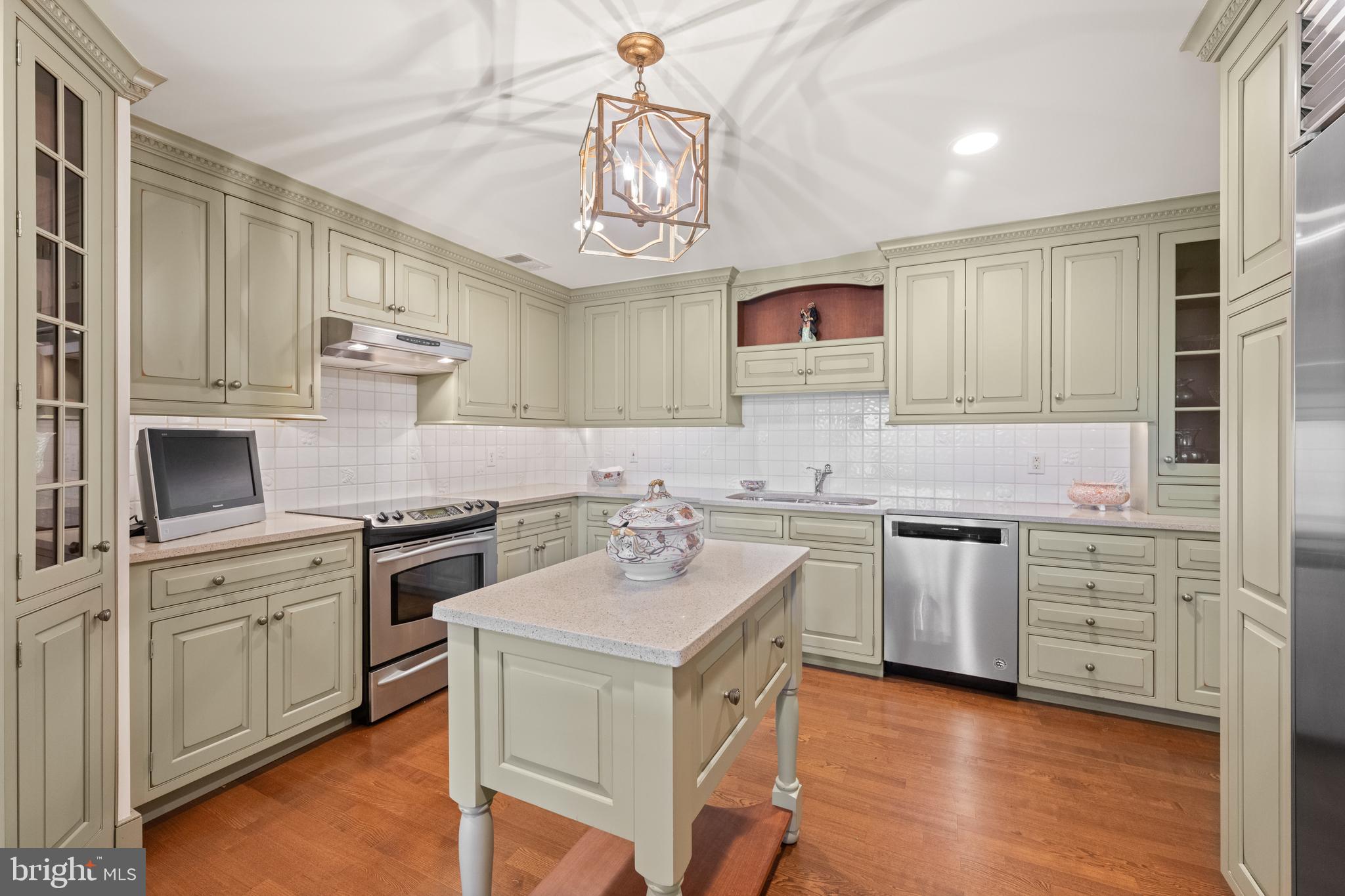 Grays Lane House #506 is located on the corner of the fifth floor, facing Merion Cricket Club with views of the Philadelphia skyline. This beautiful three bedroom, two and a half bath sensational condominium is over 2100 square feet and just steps away from the elevator. The gracious entry hall with an oversized coat closet and utility closet leads directly to the open floor plan featuring a living room, wet bar, dining room, and kitchen making it the perfect spot for entertaining family and friends for holidays and fun. The remodeled chef’s kitchen complete with custom cabinetry, Sub-Zero refrigerator, stainless steel appliances and island make it the perfect arrangement to cook with ease. The breakfast bar is great for casual dining while enjoying your view. There is also a walk in food pantry and laundry room. The primary bedroom boasts a dressing area, large closets, a sitting area, and primary bathroom equipped with grab bars in the shower and toilet. At the other end of the unit is a powder room, one bedroom which has been converted into a cozy den and a bedroom with an attached full bath. The bedrooms are at either end of the unit making them very private. The replaced windows, engineered wood floors, custom woodwork and private balcony add to the sophistication of this unit. For additional storage there are lockers below the building. Grays Lane House offers a 24/7 doorman with security throughout and on-site maintenance service. Enjoy life here within walking distance to Merion Cricket Club, Haverford Train Station, and numerous restaurants and shops. Grays Lane House does not allow any pets, unless state regulated emotional support or state regulated service animal.