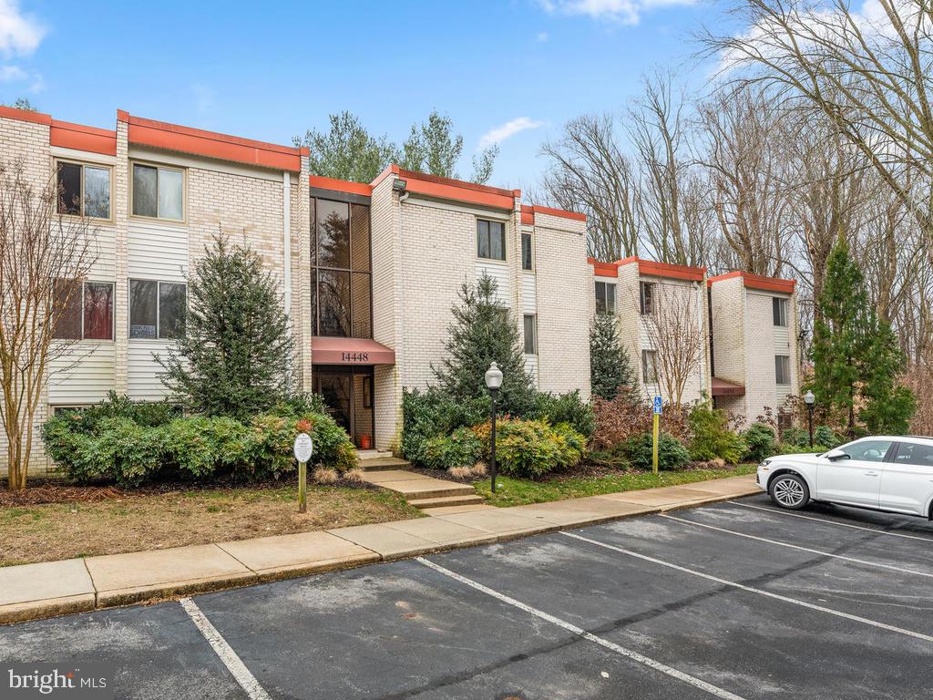 Beautiful, well maintained condo on first floor with patio.  Freshly painted and move-in ready.  Many updates including crown molding, wood floors, kitchen cabinets and stainless appliances.  Great layout with bedrooms, bathroom and laundry area on separate level from living room and kitchen. Tons of closet space throughout with walk-in closet in both bedrooms.  Water, heat & gas included in condo fee.  3 Parking spaces included.  Great location and walking distance to shopping, restaurants, recreation and commuting. Rockville & Twinbrook metro stations within 3 miles.  Within 0.4 miles, you'll find a RideOn bus stop, the Rock Creek Village Shopping Center is within 0.5 miles, featuring a variety of amenities such as Safeway, CVS, shops, restaurants, and a gas station.  In addition to the local amenities, you'll find that Rockville Town Center, Rt 270, and the ICC are just minutes away.