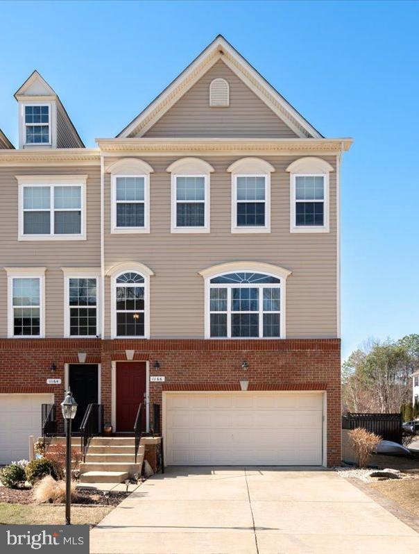 Welcome to 1166 Colbourn Corner, a beautifully maintained end-unit townhome located in the amenity-rich community of Tanyard Springs. This three-level home offers over 2,300 square feet of living space, featuring hardwood floors, a bright and open main level, and a spacious kitchen with ample cabinetry and counter space. The separate dining area and living room flow seamlessly to the large deck—perfect for entertaining or enjoying your morning coffee.

Upstairs, the private primary suite offers vaulted ceilings, a walk-in closet, and a large en suite bath with dual vanities, a soaking tub, and a separate shower. Two additional bedrooms share a full hall bath, and the laundry is conveniently located on the upper level.

The finished lower level features a cozy rec room, half bath, and access to the fully fenced backyard with a flagstone patio and fire pit. A Two-car garage and driveway offer convenient parking.
Tanyard Springs is a sought-after community with amenities that include a clubhouse, outdoor pool, 24-hour gym, tennis and basketball courts, dog parks, walking trails, and multiple playgrounds. Easy access to I-695, Route 100, Fort Meade, Baltimore, and Annapolis.

Don’t miss this opportunity to enjoy low-maintenance living in a vibrant and well-kept neighborhood. Schedule your showing today.