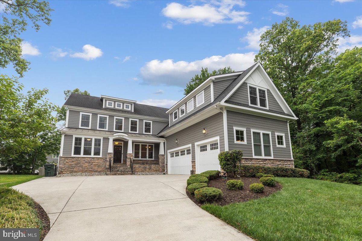 **OPEN HOUSE Sun. June 7th 2-4pm!**  Nestled on a private cul-de-sac in the heart of McLean, this exceptional Craftsman offers over-the-top comfort, timeless design, and luxurious living across three beautifully finished levels. With 7 bedrooms, 5 full baths and one half bath, thoughtfully designed indoor and outdoor spaces, this home perfectly blends elegance and functionality. A classic, light-filled foyer welcomes you inside, flanked by an elegant living room with custom-built-ins and a dining room featuring beautiful custom millwork.  At the heart of the home, the sun-drenched gourmet kitchen is designed for both everyday living and effortless entertaining, featuring an oversized island with bar seating, quartz countertops, a walk-in pantry, breakfast area, and seamless access to the screened porch for year-round enjoyment. The inviting family room opens to the kitchen and showcases a stunning fireplace with a wall of custom built-ins, tray ceiling, and direct access to the rear deck. A desirable main-level en suite provides flexibility for guests or multigenerational living, while a mudroom, half bath, and access to the attached 3-car garage complete the main level. Upstairs, the luxurious primary suite serves as a true retreat, highlighted by a tray ceiling, spa-inspired bath with soaking tub, frameless glass shower, dual vanities, and an expansive custom walk-in closet. Three additional generously sized bedrooms, each with large walk-in closets, are complemented by two full baths and a spacious media room or private office. A convenient laundry room is on this level with cabinets for storage. The fully finished lower level is designed for recreation and relaxation, featuring a sprawling rec room, dedicated endless pool room, exercise room, additional bedroom and full bath, plus walk-up access to the beautifully landscaped backyard. Outdoor living is equally impressive with a large deck, screened porch, flagstone patio with firepit, and a fully fenced yard offering exceptional privacy and space to entertain.  Custom programmable automatic blinds in the family room, kitchen, breakfast area, and staircase are thoughtfully designed to open at sunrise and close at sunset for effortless comfort and convenience.  Built by Focal Point Homes. The property backs directly onto Kent Gardens Park and is just a short walk to Kent Gardens Elementary School.  Ideally located near the heart of McLean and Tysons, with easy access to restaurants, shopping, parks, and major commuter routes. Kent Gardens, Longfellow, McLean Schools!