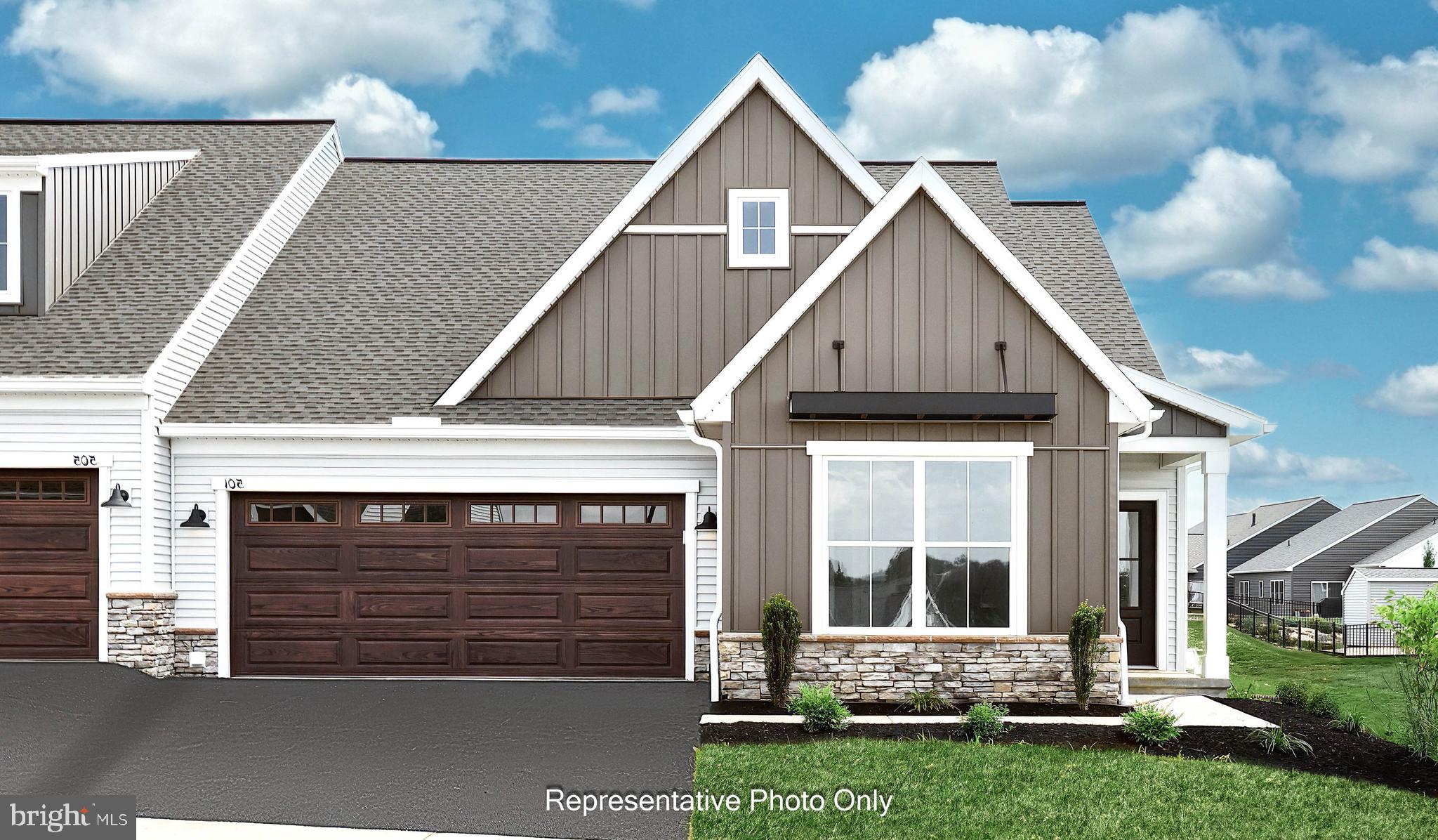 UNDER CONSTRUCTION – AVAILABLE FALL 2026: Located in the 55+ community of Winding Creek, this lovely new Bella duplex offers single-story living with elevated finishes throughout. The front entry opens to a welcoming foyer, with a secondary bedroom and full bathroom positioned nearby—perfect for guests. Stylish luxury vinyl plank flooring flows throughout the main living areas, complemented by refined door and window trim and baseboards. At the heart of the home, the well-appointed kitchen features stainless steel appliances, quartz countertops, a tile backsplash, and a spacious pantry. The open layout seamlessly connects the kitchen, dining area, and great room, creating an ideal space for both everyday living and entertaining. The great room makes a striking impression with its vaulted ceiling and cozy gas fireplace with a stone surround and painted mantel. The rear deck offers a perfect spot to relax or enjoy the outdoors. 

Tucked quietly to the back of the home, the owner’s suite provides a peaceful retreat with an oversized closet and a private bathroom featuring a tile shower, upgraded finishes, and luxury vinyl plank flooring. On the second floor, a loft, full bathroom, third bedroom, and convenient storage area offer additional flexibility.