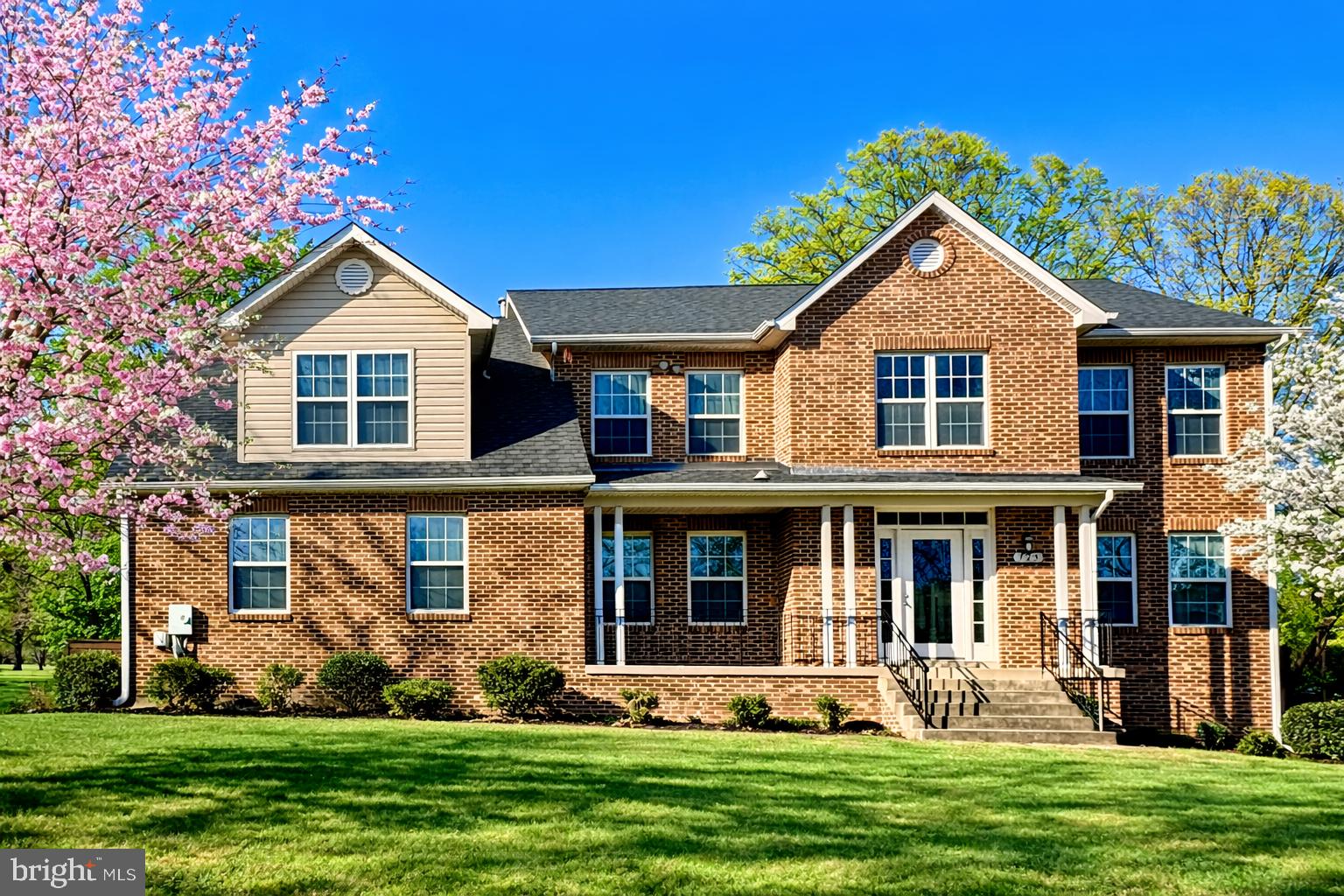 Welcome home to this spacious and beautifully designed three-level single-family residence, offering a thoughtful layout and elegant finishes throughout. The main level is ideal for both everyday living and entertaining, featuring a welcoming living room, formal dining room, and a light-filled family room with a cozy gas fireplace and soaring ceiling open to the second level. The well-appointed kitchen is a true centerpiece, showcasing stainless steel appliances, a double wall oven, built-in cooktop, double sink, granite countertops, a center island, and a charming breakfast nook. Also on the main level is a bedroom, full bathroom, study, and a convenient laundry room: perfect for guests or multi-generational living. Step outside to a large rear deck, ideal for outdoor dining and relaxing.
The upper level offers a private retreat in the expansive primary suite, complete with its own gas fireplace, walk-in closets, and a luxurious en-suite bathroom featuring double vanities, a soaking tub, and a separate stall shower. Three additional generously sized bedrooms and a full bathroom complete the upper level.
The lower level expands your living space with a large open recreation room and a versatile bonus room that could easily serve as a bedroom, home gym, or hobby space. With its flexible floor plan, elegant details, and ample room to grow, this home offers comfort, style, and functionality on every level.