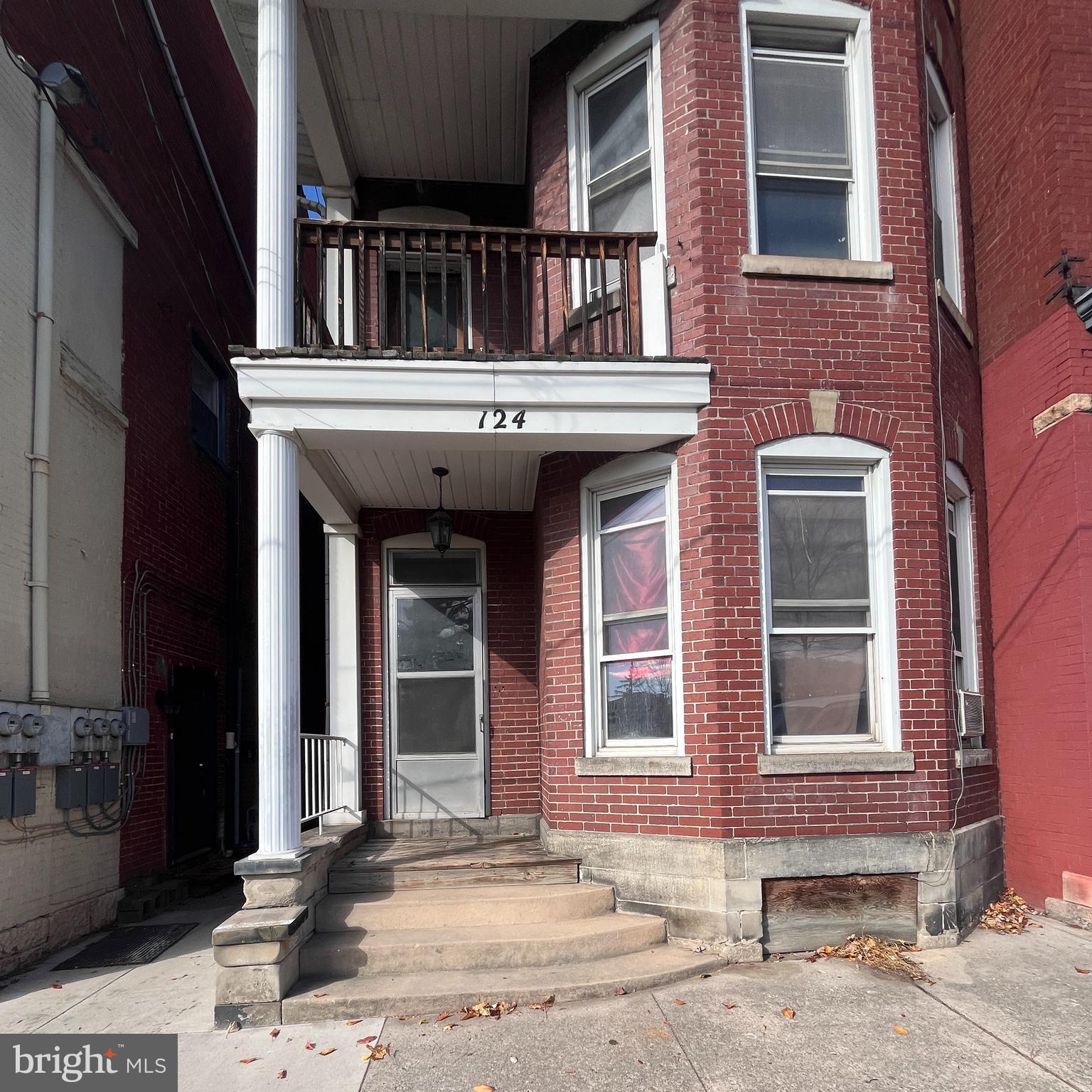 124 Bedford St is a rare multi-family or commercial opportunity in the heart of Historic Downtown Cumberland. Built in 1895 and offering more than 3,000 square feet, this stately brick property features three separate apartments, each occupying its own floor—ideal for an investor, an owner-occupant,  business offices or anyone looking to expand their portfolio in Western Maryland.   

Step inside to find ornate original woodwork, a grand winding staircase, high baseboards, and an intricately detailed fireplace mantel that showcase the craftsmanship of a bygone era. The main level includes a spacious 1-bedroom apartment, a versatile room with a decorative fireplace, and a welcoming grand foyer with both interior and exterior access to all units. 

The second floor hosts another 1-bedroom apartment, plus a flexible office/studio/bonus room and an additional half bath located in the hallway. The third-floor apartment features a generously sized layout with a large eat-in kitchen, making it an attractive rental option. 

A spacious basement provides abundant storage and potential laundry or workshop space. At the rear of the property is a charming courtyard where exterior stairs allow private access to all three levels and the spacious landings offer room for outdoor leisure in a walkable urban setting. 

Located just steps from shops, restaurants, and the vibrant energy of Downtown Cumberland, this property blends historic charm with income-producing potential. A fantastic opportunity to invest in  Mountain Maryland.