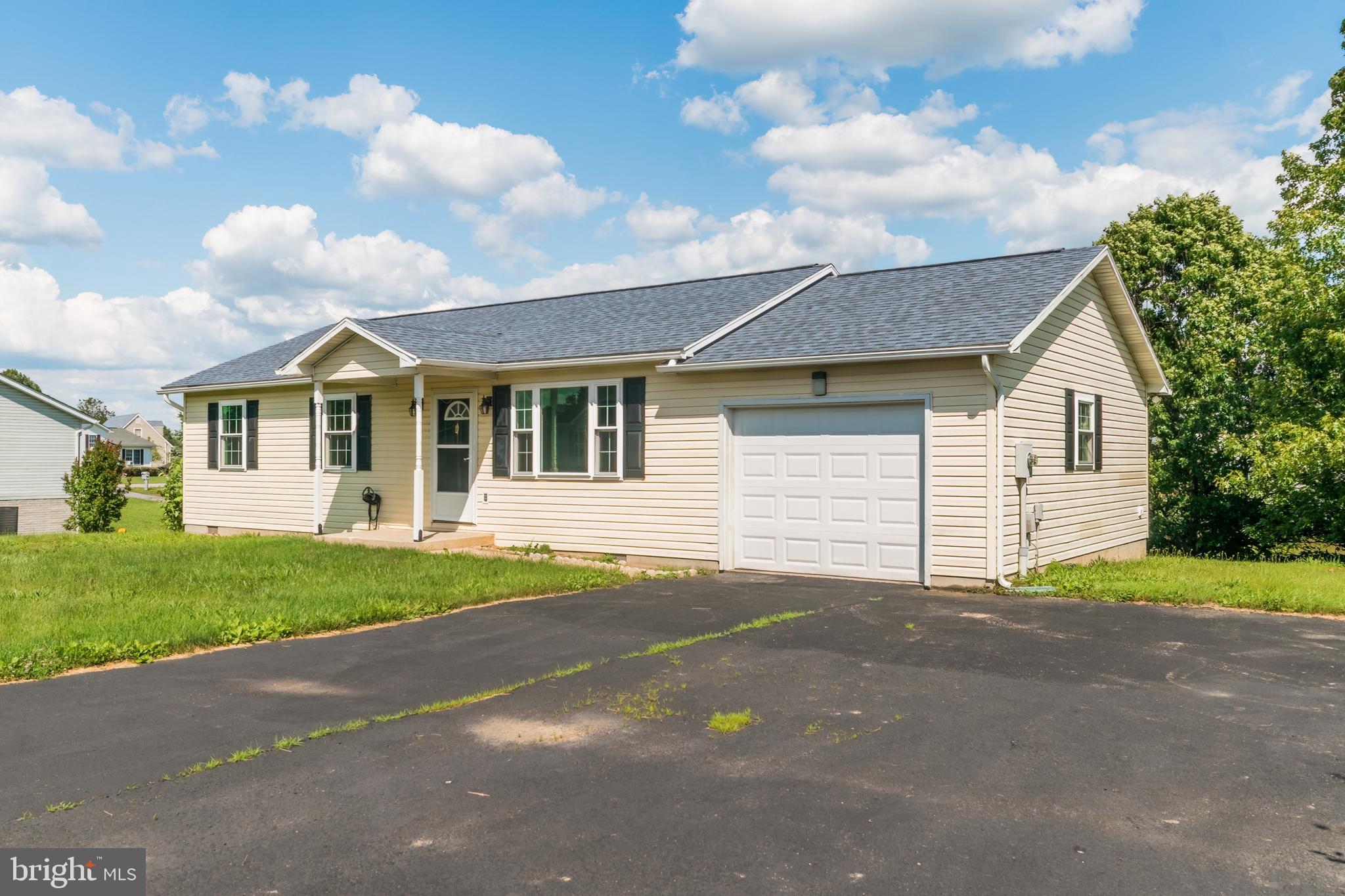 Beautifully remodeled rancher in a great location.  Open floor plan, beautiful yard, new windows, new flooring, new kitchen cabinets, freshly painted plus.