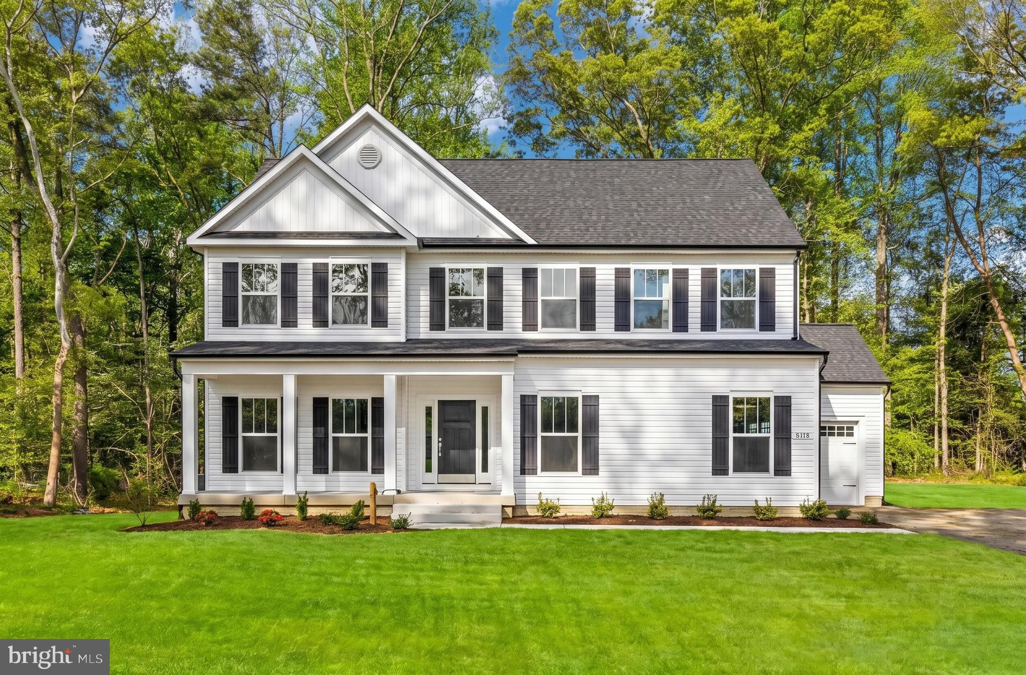Experience the quality craftsmanship of SONA Homes in this brand-new Grant model, thoughtfully sited on a nearly a half-acre homesite in King George County’s Rappahannock District. This Craftsman-style residence blends modern design with open, comfortable living—offering over 3,200 finished square feet, 4 bedrooms, and 3.5 baths across three levels. The main level features luxury vinyl plank flooring throughout, 9’ ceilings, and a bright, open-concept layout anchored by a well-appointed kitchen with granite countertops, soft-close cabinetry, stainless steel appliances, and a center island designed for both everyday living and entertaining. The adjoining family room provides a comfortable gathering space, while thoughtful trim details including crown molding and chair rail add character.

Upstairs, the spacious primary suite offers a private retreat with a walk-in closet and a well-appointed bath featuring a tiled shower with semi-frameless glass, dual vanities, and modern finishes. Three additional bedrooms and a conveniently located laundry area complete the upper level.
The partially finished lower level expands your living space with a large recreation room, private office, and a full bath—while still offering additional unfinished space and a plumbing rough-in for future customization.Outdoor living is enhanced by a 12x12 rear deck and a welcoming front porch, while a two-car garage with EV charging capability adds everyday convenience. Built with precision and backed by a 2-10 builder warranty (1-year workmanship, 1-year mechanical, 10-year structural), this SONA Homes residence offers lasting peace of mind. Additional incentives include 1% closing-cost assistance when using the builder’s preferred lender. **Some photos have been virtually staged to help illustrate the potential use and layout of the spaces**With no active HOA and a convenient location just minutes to Route 3, NSWC Dahlgren, the Nice Bridge to Maryland, and Fredericksburg amenities, this home offers new-construction quality with space, privacy, and accessibility—without the wait. Some photos may be of a similar completed home or have been virtually staged to illustrate layout and potential use of space.