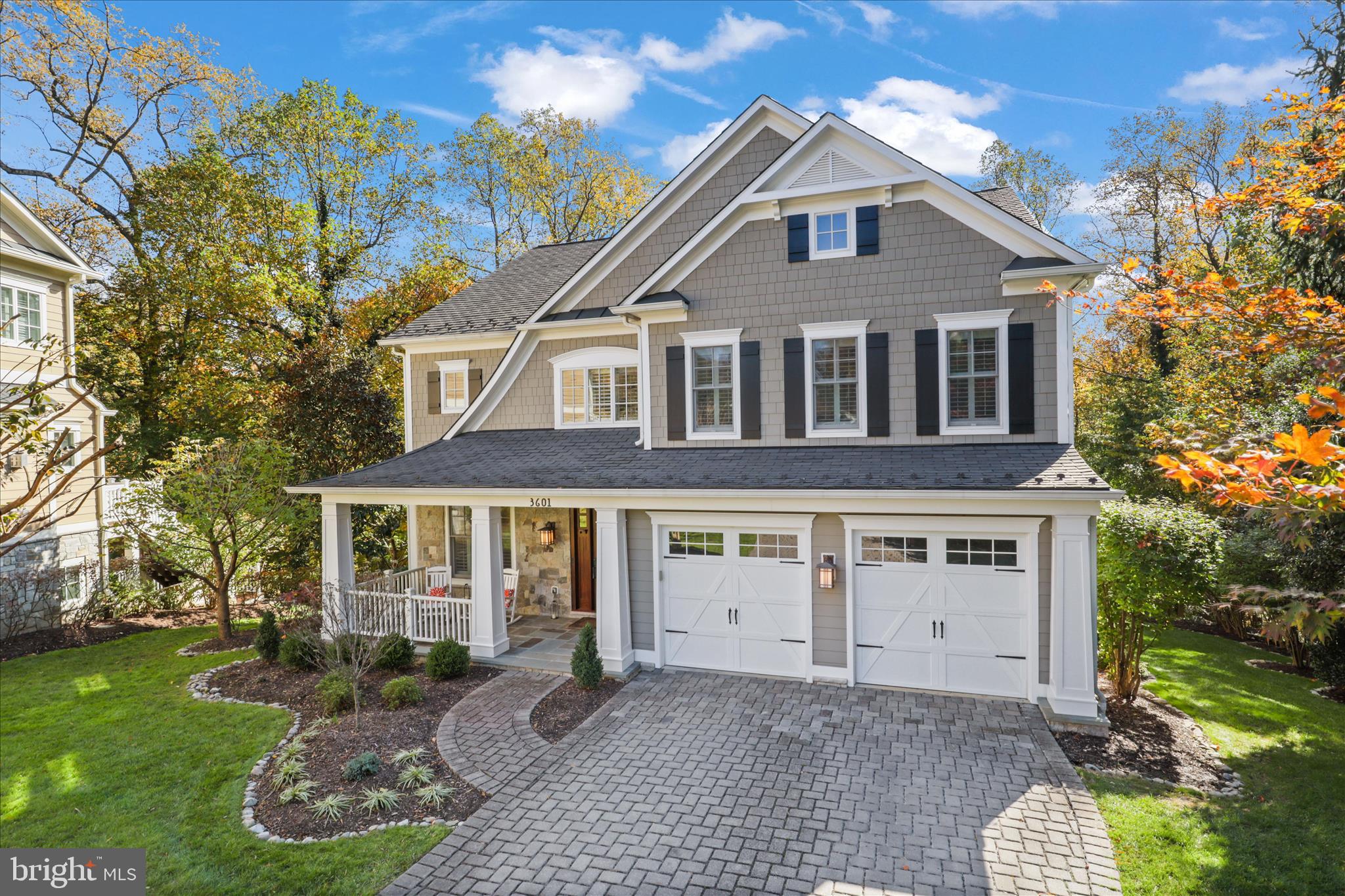 Nestled in the highly sought after neighborhood of Riverwood, this Stone/Hardie Plank Craftsman, 6008 sq. ft living area, 5-bedroom, 4.5-bathroom residence embodies the perfect blend of luxury and comfort. Eligible for Donaldson Run Swim Club, membership. Built in 2012, with a Slate roof is designed for those who appreciate high-end living and modern conveniences. As you step inside, you are greeted by an inviting foyer that leads to a Living Room, Den & spacious Family Room adorned with crown molding & coffered ceiling, Built-Ins and Fireplace, creating an ambiance of warmth and sophistication. The gourmet kitchen is a chef's dream, featuring Decora white Cabinets, upgraded Granite countertops, and Wolf and Sub-Zero appliances, large walk-in pantry, a butler's pantry, perfect for entertaining. The kitchen's island and table space provide a seamless flow for gatherings, while the formal dining room offers an elegant setting for special occasions. Retreat to the large Primary suite, where luxury meets tranquility. The en-suite Marble bathroom boasts a soaking tub, walk-in shower, and dual vanities, ensuring a spa-like experience. Each additional 4 bedrooms are generously sized, with ample closet space and easy access to beautifully appointed bathrooms. With two Gas fireplaces, cozy evenings are guaranteed. Walk-in Refrigerated Wine Cellar with 1400 bottle storage. Step outside to discover a Rare private oasis on a sprawling .79-acre private wooded lot. The exterior features a large 2 level Trex deck & screened porch and meticulously landscaped grounds that adjoin open space and Windy Run Parkland, providing serene views of the creek and surrounding trees. The property is designed for outdoor enjoyment, with an underground lawn sprinkler system ensuring your yard remains lush and inviting. Convenience is paramount, with an attached garage accommodating two vehicles and additional driveway. The home is strategically located near public transportation, making commuting a breeze. This residence not only offers luxurious living but also embodies sustainability with energy-efficient construction and appliances. Experience the exclusive lifestyle that this remarkable property provides, where every detail has been thoughtfully curated.