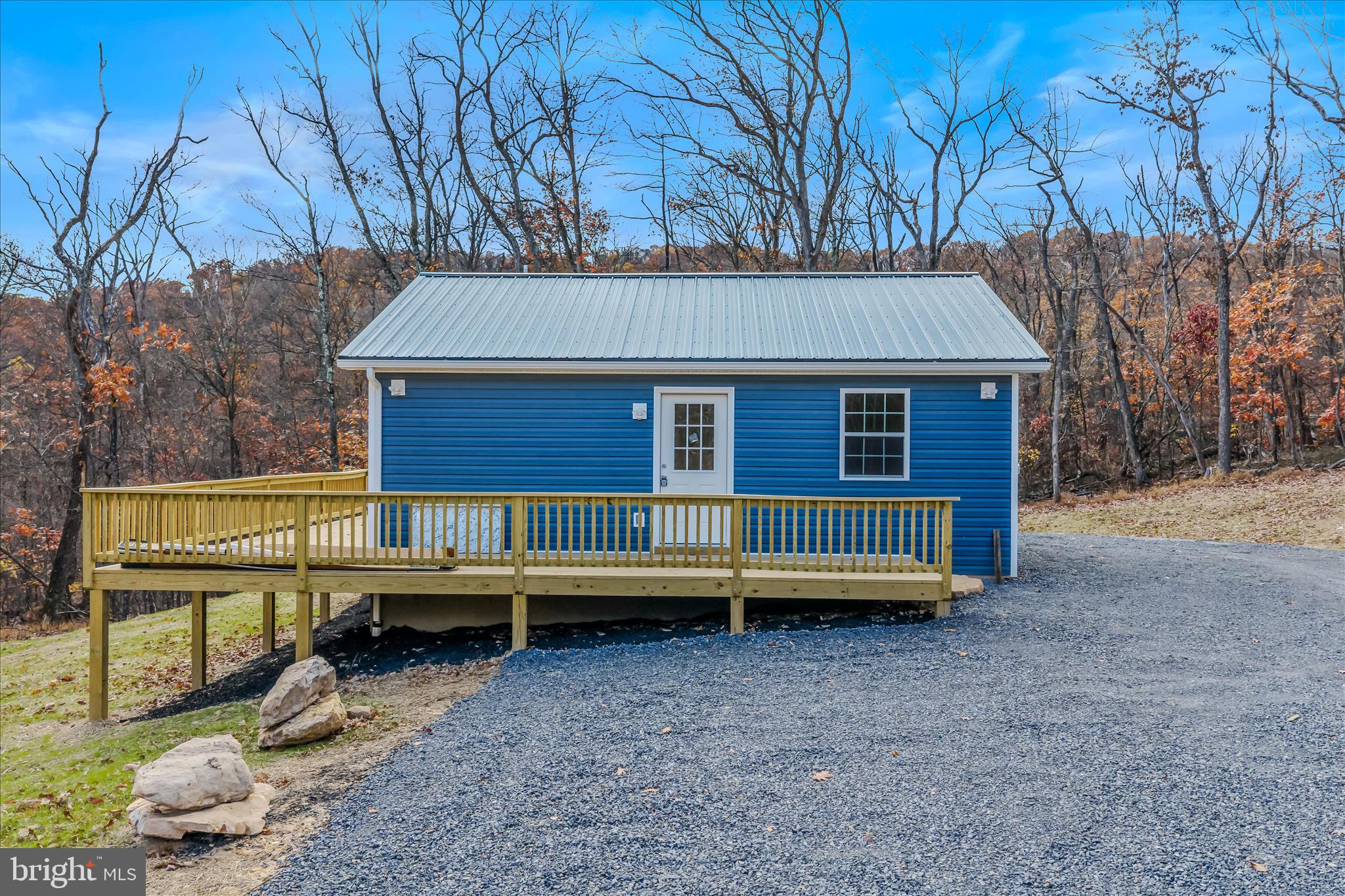 Remarkable cabin that is newly built.  2 bedrooms with one full bath, laundry hookups, wood accent walls, and much more.  Neighborhood has access to Sleepy Creek Wildlife Management area and also has their own private lake access. New stainless steel appliances and all new cabinets, countertops, and flooring.  Perched on top of a hill with a serene setting.  This one is a must see!