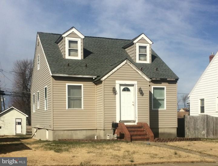 Great opportunity to own this home well below market value.Brand new roof,newer. windows,wood floors,nice large level fully fenced backyard,remodeled kitchen, brick bar in basement.Home needs work but perfect for investor or 203k loan .As is sale.