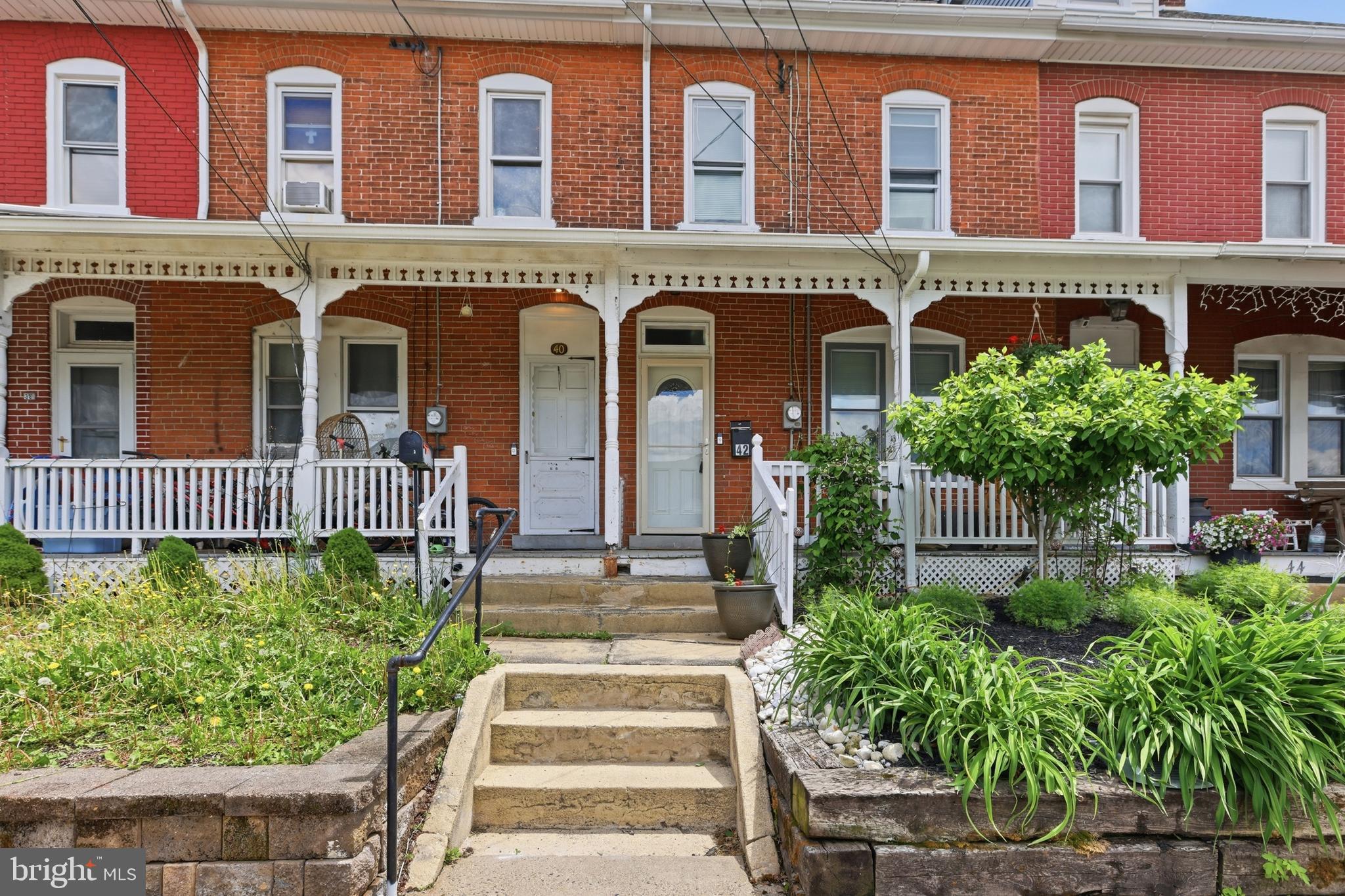 Full of character and timeless charm, this beautifully maintained 1915 home in desirable Telford Borough offers over 1,500 square feet of inviting living space with 3 bedrooms and 1 full bath. Set along a welcoming street, the home greets you with a quaint covered front porch — the perfect place to relax and enjoy the neighborhood setting. Inside, the spacious living room features hardwood flooring, abundant natural light, and a striking wall of custom built-in shelving. The traditional yet functional layout flows seamlessly from the living room into the formal dining room and open kitchen, with easy access to the backyard for everyday living and entertaining. The second floor offers a generously sized primary bedroom complete with a versatile dressing area, home office, or sitting space, along with a bright secondary bedroom and a large full bath. The third-floor bedroom provides an expansive and flexible retreat ideal for a guest room, studio, playroom, or additional workspace. Additional highlights include a stone foundation basement with laundry and ample storage, plus a fenced backyard featuring a private patio area, raised garden beds,  and a garage. Updates include bathroom remodel 2024, new sump pump & water softener 2023, new gutters 2023, and a drywell drainage system in the backyard added in 2023, garage/garage roof redone in 2021, new roof 2019, as well as a one year home warranty! Conveniently located just minutes from downtown Souderton’s shops, restaurants, and community events, with easy access to Routes 113 and 309, and nearby Sellersville, Hatfield, and Harleysville, this home combines historic charm with everyday convenience.