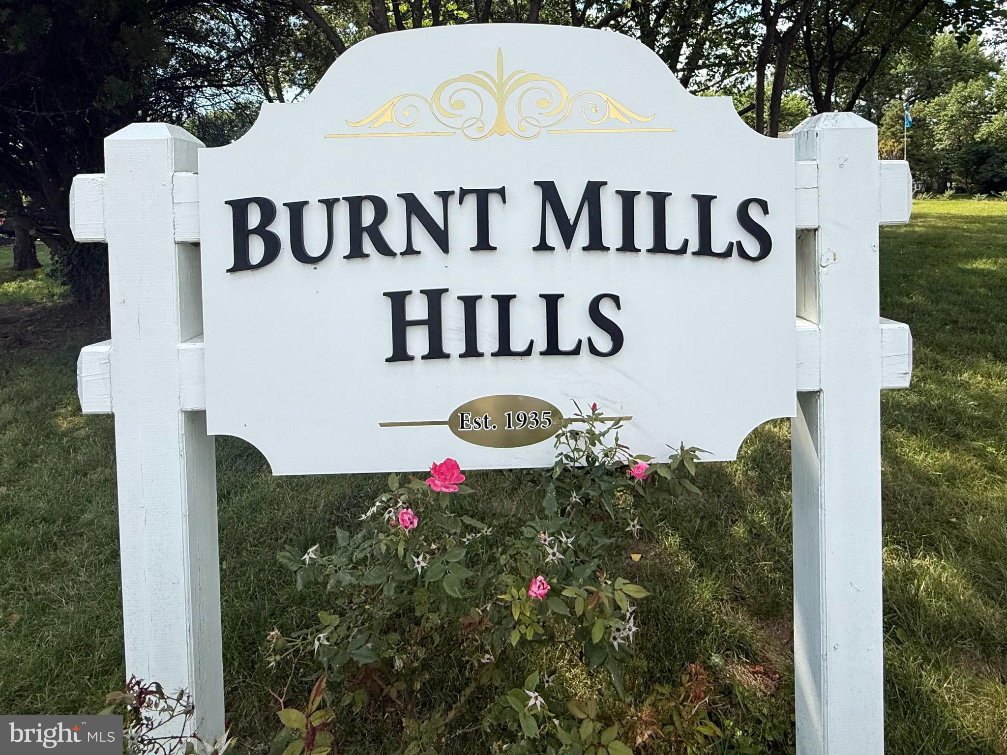 ***********Open House, Saturday, 6/27 |  12:00 - 3:00 P.M. 
Private 1.15-Acres with Swimming Pool, Beautifully Renovated Kitchen (2022), 3 Spacious Levels, 4 Bright Bedrooms, 4 Exquisitely Finished Full Bathrooms (2022), 5,400+ Sq. Ft. & Potential for Future In-Law Residence************************************************************
Rare opportunity to own a distinctive property in the highly sought-after Burnt Mills Hills community. Situated on an expansive 1.15-acre lot, this all-brick residence offers over 5,400 square feet of living space across three levels, providing exceptional flexibility for today's lifestyle needs. The home features spacious living and entertaining areas--sunroom, family room, recreation room,  two fireplaces, generous bedroom room sizes, and abundant natural light throughout. Beyond the foyer, rich hardwood floors lead into the impressive formal living room, where a striking wall of custom built-in cabinetry and shelving creates a sophisticated focal point—perfect for displaying treasured collections, creating a curated library, or showcasing art. A classic fireplace with elegant mantel anchors the room, while oversized windows bathe the space in natural light. 
Adjacent to the living room, the formal dining room offers an elegant setting for entertaining, complete with hardwood flooring, a stunning chandelier, and timeless architectural details that create an atmosphere both refined and welcoming. At the heart of the home is the beautifully renovated (2022) gourmet eat-in kitchen—a space designed for gathering, conversation, and culinary creativity. Bathed in natural light from multiple oversized windows overlooking the lush grounds, the kitchen features expansive granite countertops, abundant cabinetry, stainless steel appliances, contemporary tile backsplash, generous prep space, and extensive storage. The adjoining breakfast area provides the perfect spot to enjoy morning coffee while taking in tranquil views of the surrounding greenery, making this kitchen the true centerpiece of the home. The main level offers three generously sized bedrooms, each enhanced by abundant natural light and peaceful views of the surrounding property. Beautifully renovated primary and hall bathrooms reflect thoughtful design and spa-inspired finishes.  The upper level includes a private bedroom and full bathroom, ideal for guests, extended family, a home office, or an au pair suite. The lower level offers substantial additional recreation space,  storage, and a luxurious full bathroom elevates the space. Outdoor living is equally impressive with an in-ground pool, covered stone patio, and beautifully landscaped grounds designed for relaxation and entertaining. An oversized two-car attached garage and an extended driveway provide ample parking for residents and guests alike. One of the property's most exceptional features is the expansive adjacent lot, which offers the potential space for an accessory dwelling/in-law residence, subject to county approvals and zoning requirements. Opportunities to own a lot of this size in such a desirable location are increasingly rare. Burnt Mills Hills is known for its estate-style homes, mature trees, and convenient access to major commuter routes including I-495, Route 29, New Hampshire Avenue, and the ICC. Residents enjoy proximity to Downtown Silver Spring, Four Corners, shopping centers, restaurants, parks, schools, and numerous recreational amenities. Whether you're seeking multi-generational living options, room to expand, space to entertain, or simply the privacy  of a large estate-style lot, this remarkable property delivers!
