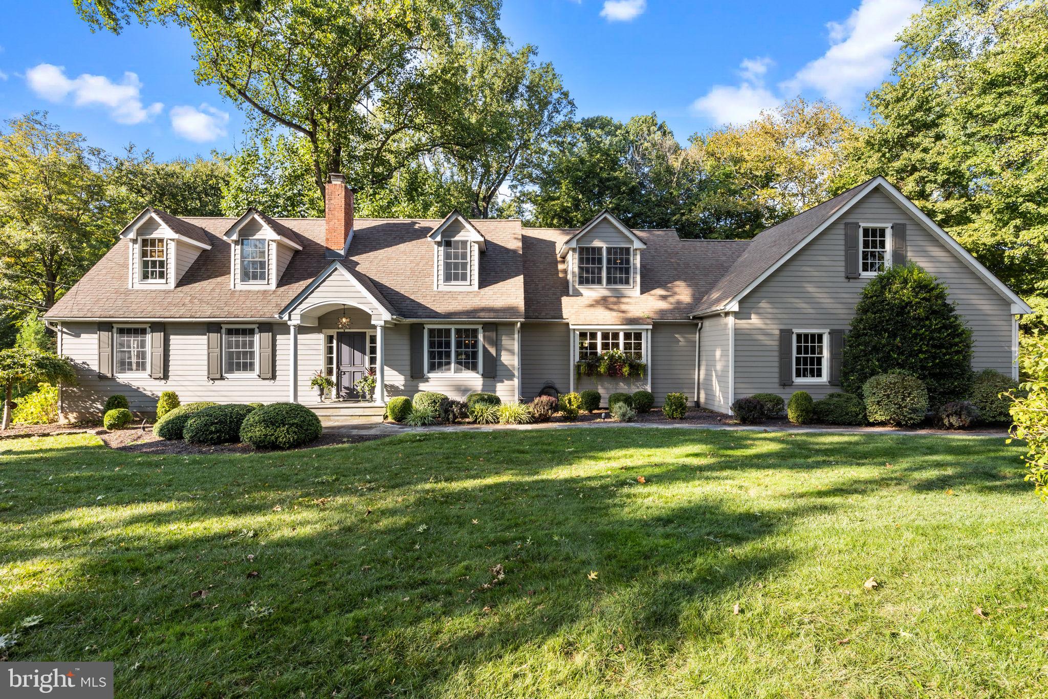 Thoughtfully updated and expanded from the original cape design this renewed 4 bedroom (FIRST FLOOR MASTER SUITE), 4 full bath home situated on .66 acres exudes all the character and craftsmanship you would expect to find in an older home blended with the modern amenities of today. The open floor plan is anchored by the gourmet kitchen with large center island, leathered granite countertops, tile backsplash, stainless steel appliances, Thor 6 burner gas range top, double ovens and an abundance of custom cabinetry and storage. The eating area has banquette seating with built-in storage and is adjoined to the family room delineated by architectural columns. This bright and stylish area showcases a wall of custom built-ins, large picture window overlooking the expansive backyard and a door opening to the rear EP Henry patio shaded by a beautiful pergola. There is a mud hall tucked away just off the kitchen with convenient laundry, coat closet, ﻿niche with bench and access to the 2 car garage and side entry. The elegant dining room has a built-in china cabinet and the walls are enveloped with a natural grass cloth wallpaper. The sophisticated  living room retreat features a wall of windows allowing for the sunlight to stream into the room and a wood burning fireplace with built-in book cases. The opulent sunlit first floor master bedroom suite is exquisitely finished with elongated oversized windows with transoms, a dramatic vaulted tray ceiling, a wall of custom cabinetry and a large walk in closet. The stunning master bath boasts a quartz double vanity, a soaking tub and a custom tile glass shower. A full hall bath and office area complete this floor. Continue to the second level where you will find a nice size bedroom with walk in closet, a hall full bath with pocket door, a den area connecting to  two additional large bedrooms with a Jack and Jill bath. Just off the second floor is a door to an oversized unfinished area where the possibilities are endless for adding additional living space.
﻿Added features that complete this uniquely magnificent home include: NEW ROOF 1/2026! Gleaming hardwood floors throughout, custom moldings and millworker, extensive hard scape including a stamped concrete driveway, EP Henry patio, bluestone walkways, professionally landscaped yard with outdoor lighting, underground sprinkler system, security system with exterior cameras, Hardie Plank siding. Close proximity to the historic canal path, Delaware River boat slip, the quaint town of Yardley Boro, major roadways, trains and shopping.  
﻿This stunning home exudes quality and charm and is waiting for you to call it home!