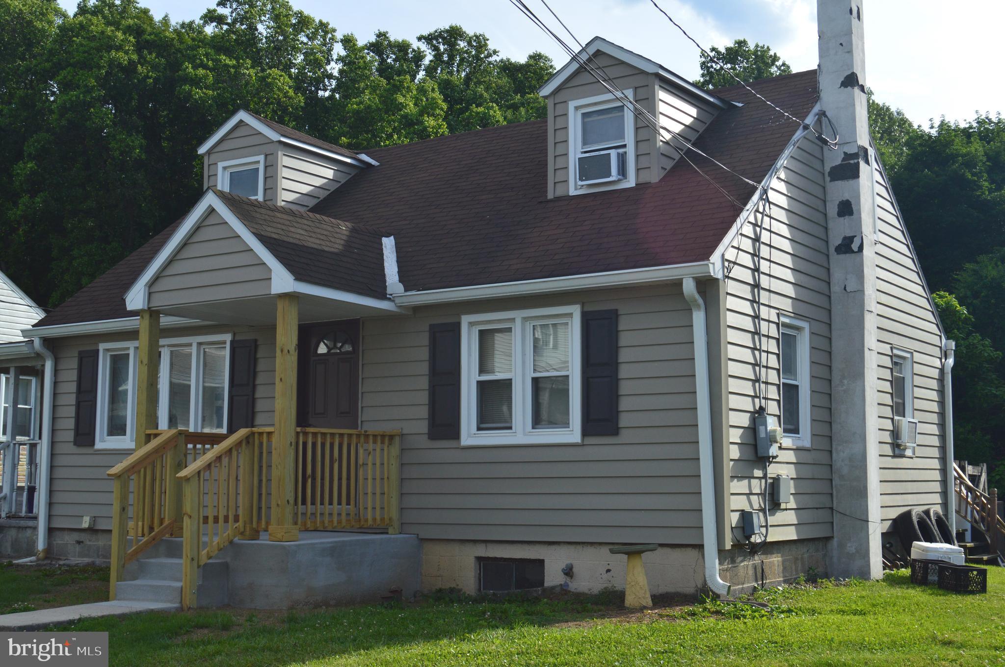 INVESTOR ALERT! Four bedroom Cape Cod style home situated on a .26 acre lot that backs to wooded area. Home needs updating and repairs, but priced accordingly. Oversized 2 car detached garage and shed storage offer plenty of storage space. Some upgrades include: newer spouting, installation of a French Drain in the basement, yearly service on the furnace, 200 Amp electric service instated in 2014. There is a 2 bedroom mobile home located on the property. A variance would need to be obtained from the township to allow it to be in inhabited. Home has its own utilities. Mobile home does need substantial work, but with a variance and rehab, it could be a desirable investment! Home is being sold in As Is condition. No FHA or VA. Cash offer preferred.