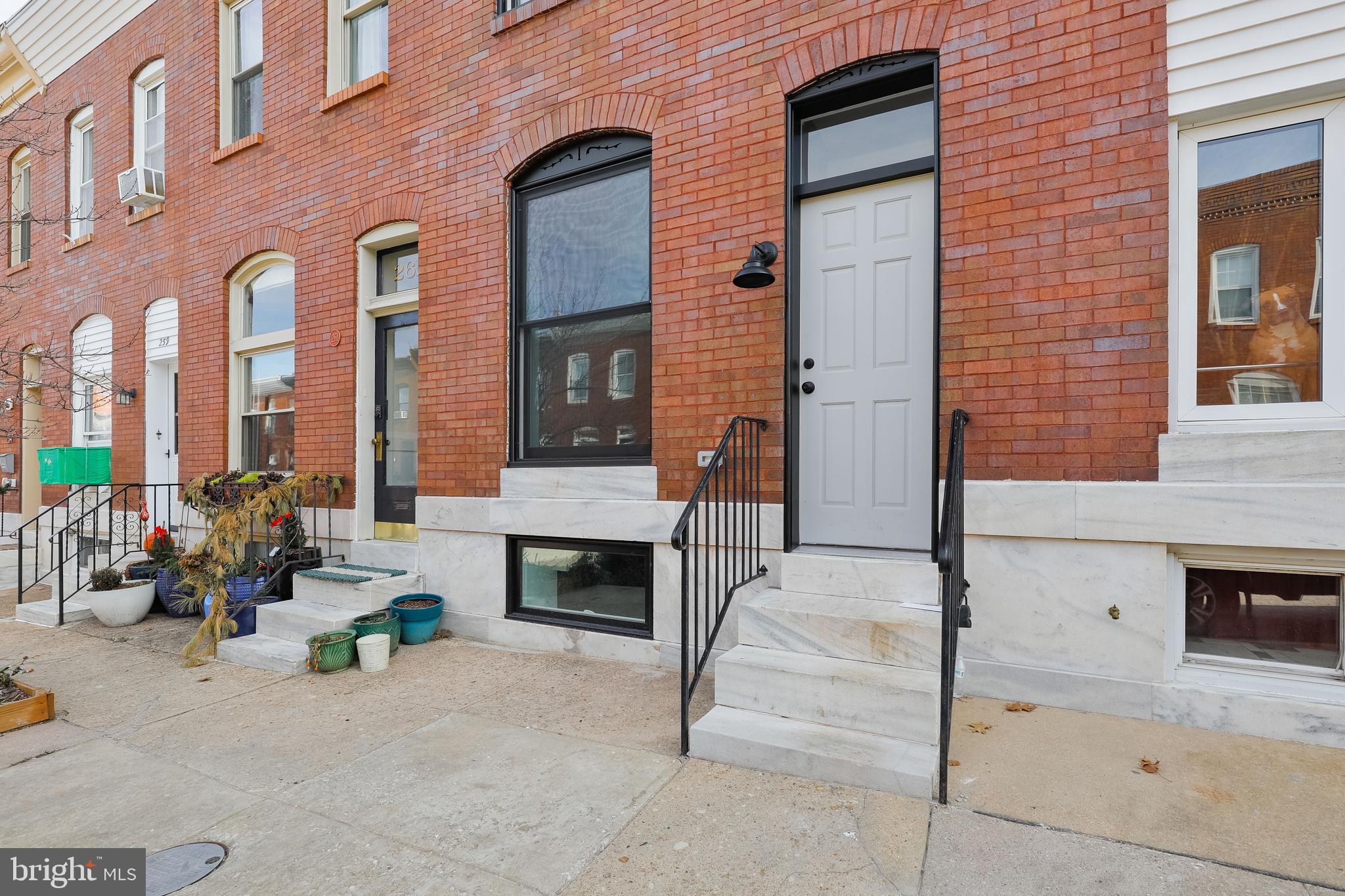 BRAND NEW CHAP RENOVATION BY BRD CONTRACTING LOCATED IN PATTERSON PARK ON EXTREMELY SOUGHT AFTER BLOCK. GLISTENING HARDWOODS CASCADE THROUGHOUT. ENJOY CUSTOM SOFT CLOSE CABINETRY, UPGRADED TRIM AND PAINT PACKAGE, IMPORTED TILE, GORGEOUS GRANITE COUNTERTOPS, SS APPLIANCES IN DESIGNER CHEF'S KITCHEN. EXPOSED BRICK. LOADS OF NATURAL LIGHT. FINISHED LOWER LEVEL. HIGH CEILINGS. TONS OF STORAGE. WALK-IN SHOWERS. WALK-IN CLOSETS. SPACIOUS 4 BEDROOMS WITH 3 BATHROOMS. EXPANSIVE ROOF DECK FOR ENTERTAINING WITH INCREDIBLE VIEWS. CLOSE PROXIMITY TO RETAIL SHOPPING, LOCAL DINING, PATTERSON PARK, AND ALL MAJOR HIGHWAYS.