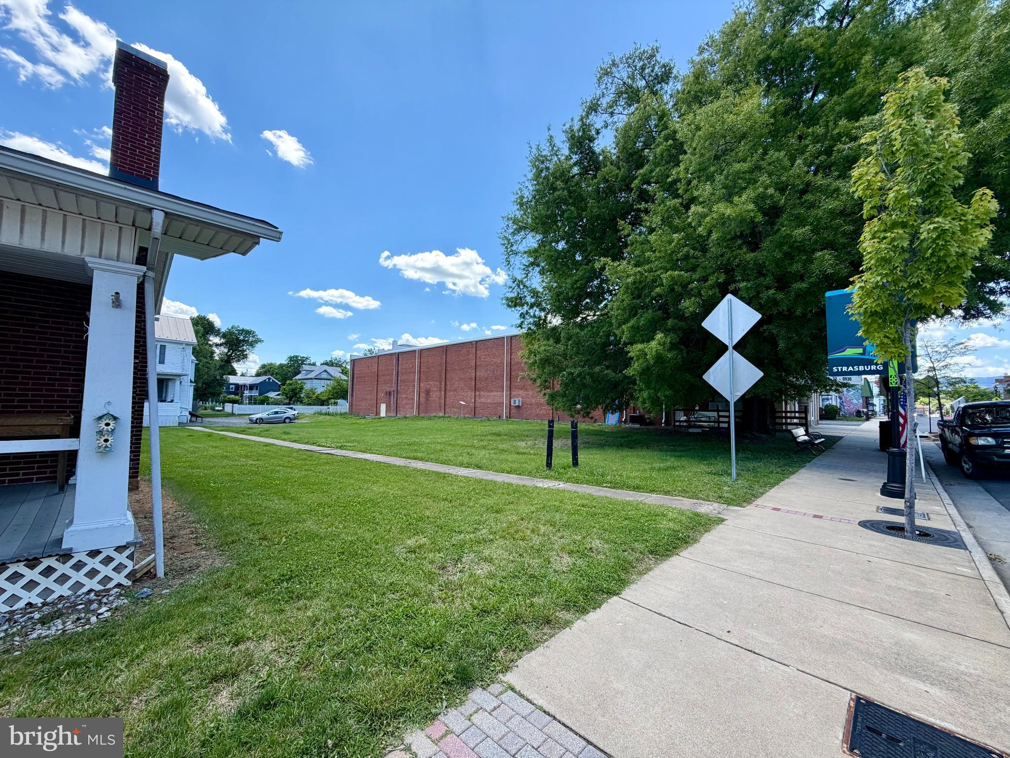 Rare commercial lot opportunity in the Town of Strasburg! This level, open 0.22-acre parcel offers excellent road frontage and visibility in a convenient downtown location within town limits. Public water and sewer hookups are available, along with electric, phone, cable, and fiber optic internet access. Zoned Commercial/Industrial, this property offers a variety of potential uses subject to town approval and zoning regulations. It is conveniently positioned with street frontage in an established area of Strasburg. Buyer to verify all intended uses, utilities, and zoning information.

Per information provided by the Town of Strasburg, Historic Commercial (B-H) zoning allows a minimum 4-foot front setback on King Street, 0-foot side setbacks, and up to 35-foot building height. Buyers should verify all intended uses, setbacks, utilities, and zoning requirements with the Town of Strasburg.