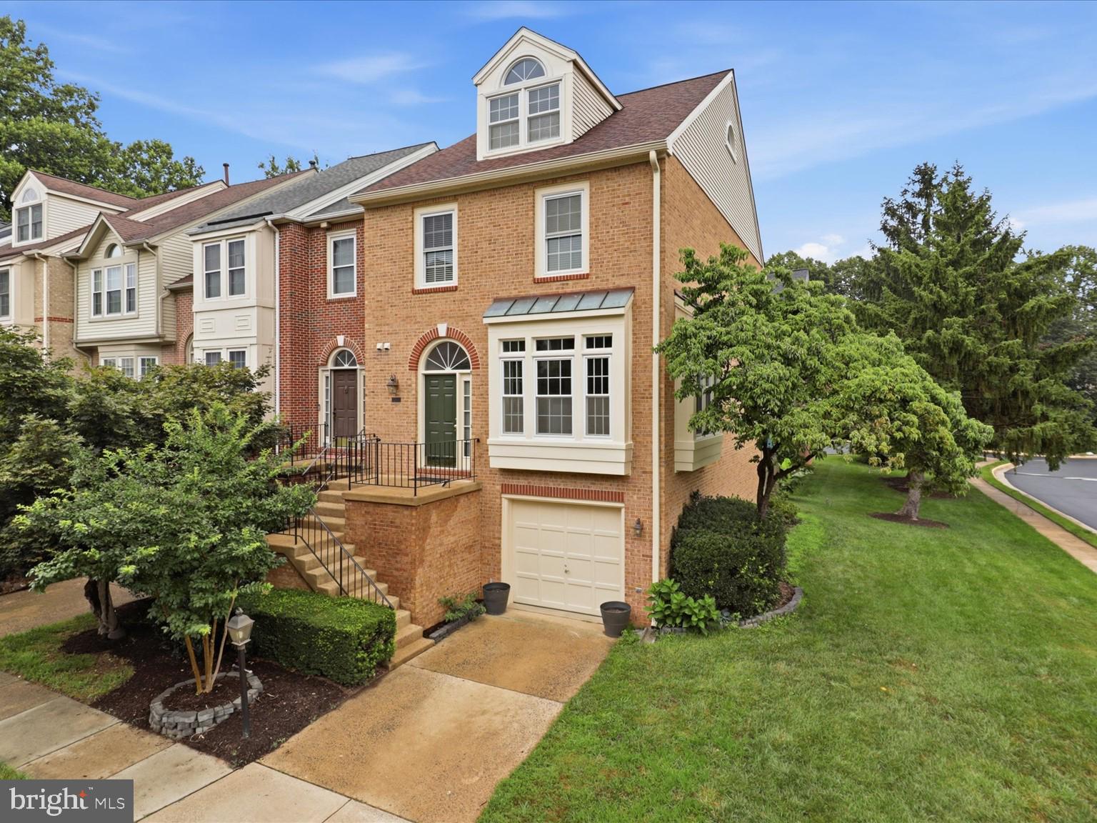 Discover exceptional living in Fairfax's Penderbrook community, where golf course views meet resort-style amenities. This vibrant neighborhood offers a pool, fitness center, and sports courts, ensuring an active and engaging lifestyle.

This meticulously updated corner unit boasts fresh paint, new carpet, modern LED lighting, and a recently refreshed private deck. Enjoy peace of mind with significant  recent upgrades: a new HVAC system (2024), roof (2022), windows (2021), and a brand-new stove.  This home is move-in ready!

The sun-drenched main level features a  large  kitchen with granite countertops and stainless steel appliances, flowing seamlessly into the family room. A cozy living room with a gas fireplace opens directly to your private deck. Engineered wood flooring spans both the main and basement levels, complemented by an updated powder room on the main level .  High quality wood trim  accent the main level 

Upstairs, you will find three comfortable bedrooms and a versatile loft, perfect for an office or lounge, complete with built-in storage. The  large master suite is a true retreat with a cathedral ceiling and a spacious walk-in closet.  The  Master bedroom has a ensuite bathroom,  complimented  by an additional full bath in the hallway.  The two bedrooms have ample closets and ceiling lighting. 

The walk-out basement is an entertainer's dream, offering a full bath, a large family room  which can serve as a guest room with a wet bar, and a convenient laundry room with included washer/dryer. 

A one-car garage provides both parking and ample storage.

Commuting is effortless with quick access to Route 50, I-66, and West Ox Road. Bus stops are just a short walk away, connecting you to the Vienna Metro and destinations across Fairfax County..  Supermarkets,  shopping  malls,  hospital and other amenities all within 5 minutes drive or pedestrian accessible.   This home is in  the Oakton  High School  pyramid. 

This exceptional home offers comfort, convenience, and a fantastic community. Schedule your visit today; this opportunity won't last long!
