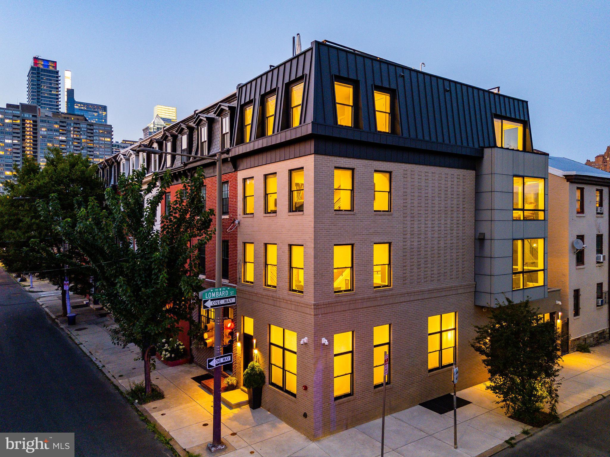 Contemporary, sun-drenched, and perfectly positioned​ - welcome to 431 S 20th Street.

Situated on a premier corner in Rittenhouse Square, this striking townhome by Maguire Builders seamlessly blends sleek modern design with warm, custom finishes and flexible functionality. With 3–4 bedrooms, 3.5 baths, multiple living areas, and a 2-car garage, it checks every box for elevated city living.

Design highlights include site-finished walnut-stained oak floors, walls of Pella windows, soaring ceilings, dual-zone HVAC, ​recessed lighting and custom cabinetry by Lutzwood. The gourmet kitchen is outfitted with a Sub-Zero refrigerator, Wolf 6-burner stove, oversized quartz island, and under-cabinet lighting​ - flowing effortlessly into a dedicated dining area and cozy living space with a custom tile-and-wood fireplace surround.

Just off the kitchen, a bright and inviting family room opens to a private deck​, ideal for al fresco dining or relaxing with a morning coffee. This space features a sleek floor-to-ceiling tile fireplace, custom wood shelving, and refined architectural details that add warmth and style.

The primary suite is a true retreat, offering a spa-like bath, a custom walk-in closet, tray ceilings and modern fan and wrap around windows . Upstairs, two additional bedrooms, a beautifully finished hall bath, a wet bar, and access to the rooftop deck with panoramic city views create the perfect indoor/outdoor entertaining space.

The fully finished basement features high ceilings, a full bath, and flexible living space​, ideal for a fourth bedroom, nanny suite, home gym, or media room.

Located in the Greenfield Catchment,​ just blocks from Rittenhouse Square and some of Philadelphia’s best dining, shopping, and cultural destinations​ and steps away from the Lombard Swim Club.   

Approximately 3.5 years remain on the tax abatement.​  You won't want to miss out on this gem in Rittenhouse Square.