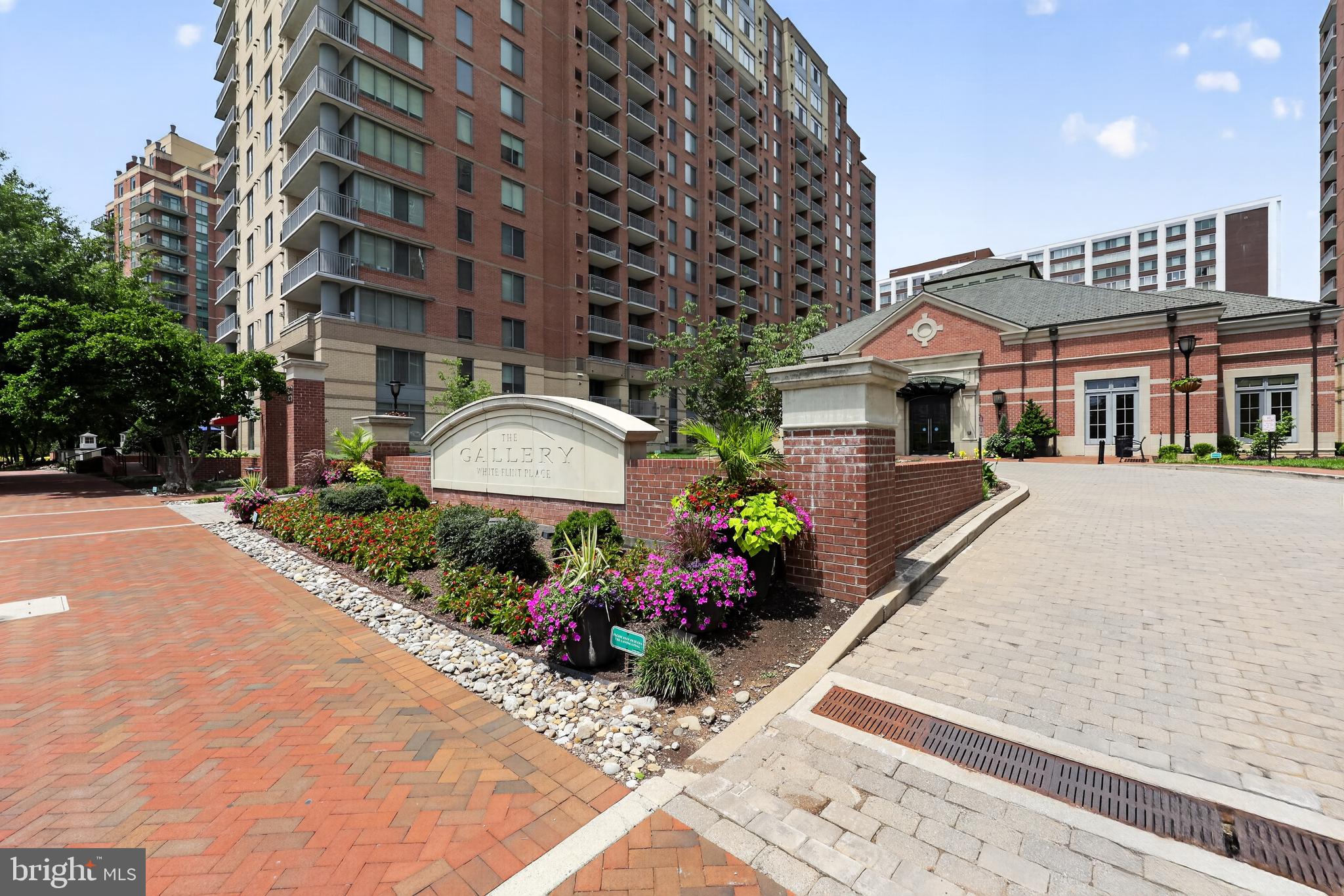 Experience luxury living in the heart of North Bethesda! This second-floor one bedroom - one bathroom residence offers 797 square feet of living space, with private balcony. Equipped with new HVAC system, and new washer and dryer, you’ll have the ultimate peace of mind. The home also includes one covered garage parking space and a storage unit conveniently located directly beneath the building.
Residents of The Gallery enjoy resort-style amenities, including a 24-hour concierge, outdoor swimming pool, state-of-the-art fitness center, resident lounge with a bar and piano, private dining room with a full kitchen, library, co-working spaces, billiards room, theater room, grilling area, beautifully landscaped grounds, and an on-site convenience store.
This condo’s location could not be more perfect! You will be in walking distance to restaurants, shopping, and entertainment, and just steps from the White Flint Metro Station. Enjoy easy access to I-270, Bethesda, Rockville, the National Institutes of Health (NIH), Walter Reed National Military Medical Center, and Washington, D.C. Whether you're looking for convenience, luxury, or a vibrant urban lifestyle, this exceptional condo offers it all.