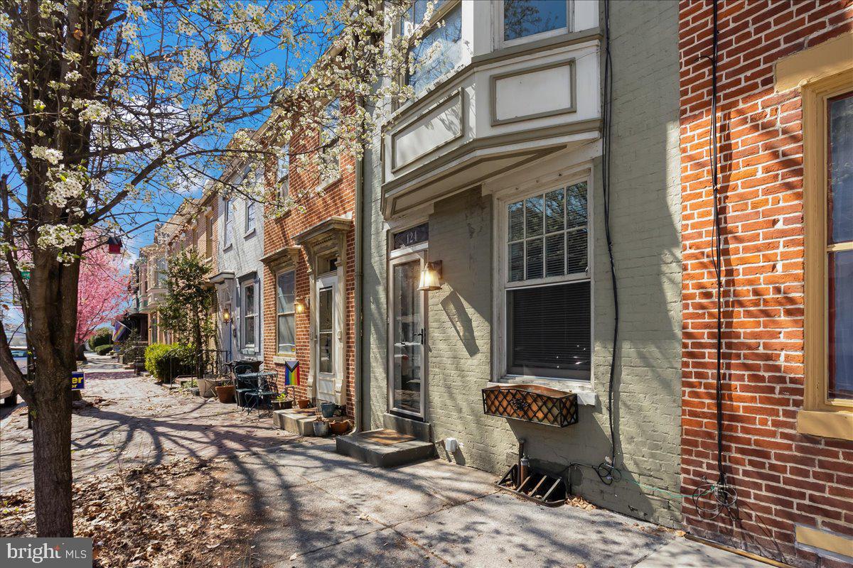 Welcome home to 124 Boas Street, a beautifully updated home brimming with character and charm, nestled in a quiet, walkable neighborhood. This historic gem, built in 1863, offers the perfect blend of classic architectural details and modern conveniences.

Step inside to discover gleaming hardwood floors, tall ceilings, and an abundance of natural light pouring through large windows, creating a warm and inviting atmosphere. The open floor plan offers spacious living and dining areas that flow effortlessly into each other, while the updated kitchen provides the perfect space for cooking and entertaining. Sip your morning coffee in peace on your private patio.

Upstairs you will find your primary bedroom, complete with large windows and a walk in closet. Down the hall is a completely renovated bathroom and additional bedroom. The third floor has been beautifully finished with potential for a 3rd bedroom, office, or additional living space. The basement provides an abundance of storage as well as access to utilities.

Key updates include energy-efficient mini-split heating and cooling systems (2021), 200-amp electrical service (2021), and a new hot water heater (2021), ensuring peace of mind and comfort for years to come.

The property is ideally located in a quiet, tucked-away section of Midtown, yet still offers easy access to the vibrant downtown area and Front Street. Enjoy the convenience of being just minutes from local shops, restaurants, parks, and cultural attractions, while also experiencing the tranquility of a residential street.

Whether you’re looking for your first home or a solid rental investment, this home offers both character and practicality in a location that can’t be beat. Schedule your showing today!