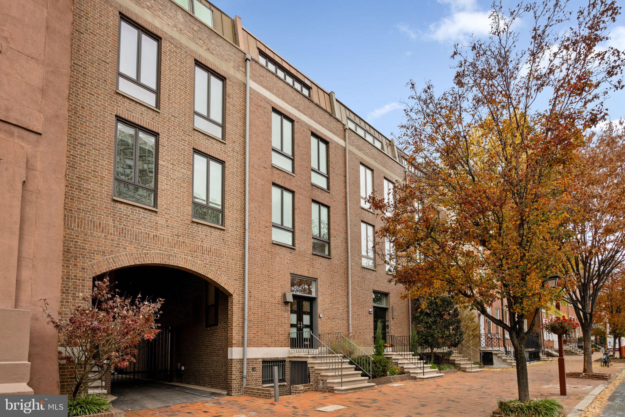 Discover expansive designer living in this contemporary five-bedroom plus office, five-and-a-half-bathroom elevator townhouse featuring magazine-worthy interiors, phenomenal storage, private outdoor space, and parking in sought-after Society Hill.

This breathtaking move-in ready residence provides a wonderful footprint for busy daily life and elegant entertaining with five levels of expanded living space, luxurious beds and baths, and a charming patio. Soaring ceilings with recessed lighting and designer fixtures rise over gleaming hardwood floors and spectacular art walls featuring custom niches and cabinetry. From the bright foyer, you're ushered into a lovely dining room wrapped by built-ins and a clerestory window. Below, the sunken living room invites you to relax in front of the gas fireplace while French doors tempt you out to the patio for a seamless indoor-outdoor lifestyle. Off the dining room, a butler's pantry/command center leads to the eat-in chef's kitchen, where stone counters and subway tile backsplashes top rows of custom Joanne Hudson cabinetry. The fleet of upscale Miele appliances includes a vented gas cooktop, wall oven, microwave, warming drawer, French door refrigerator, and dishwasher. The sunny breakfast room is perfect for casual meals, and a coat closet and powder room complete the well-planned level.

Head upstairs or board your private five-stop elevator to discover the second level's full-floor owner's retreat — a serene sanctuary featuring a sprawling bedroom, a laundry room, and walls of custom closets, cabinetry, and shelving. The en-suite spa bathroom impresses with a glass-brick rain shower, soaking tub, and roomy floating vanity. An extra-large office on this level could easily serve as a work-from-home destination, a nursery, or a sixth bedroom as needs dictate. On the third floor, two secondary suites enjoy large windows, excellent closet space, and private baths, while the top floor offers two more bedrooms and a fifth full bathroom.

On the lower level, an oversized rec room with a separate entrance and a wall of built-ins is perfect as a playroom, media room, home gym, au pair suite, or all of the above, with exceptional storage, a climatized wine room, shop area, secondary laundry room with back-up refrigerator and full bathroom nearby. This flawless home includes a green roof and zoned HVAC with 13 heating zones and three for air-conditioning, and two gated parking spots.

Located on a pristine tree-lined street in the heart of coveted Society Hill, this home is just inches from glorious outdoor space, including gardens, playgrounds, and historic national monuments. Enjoy easy access to fantastic Center City shopping, dining, and nightlife, while multiple bus lines, PATCO and SEPTA stations, and the Delaware Expressway put the rest of the city within easy reach.