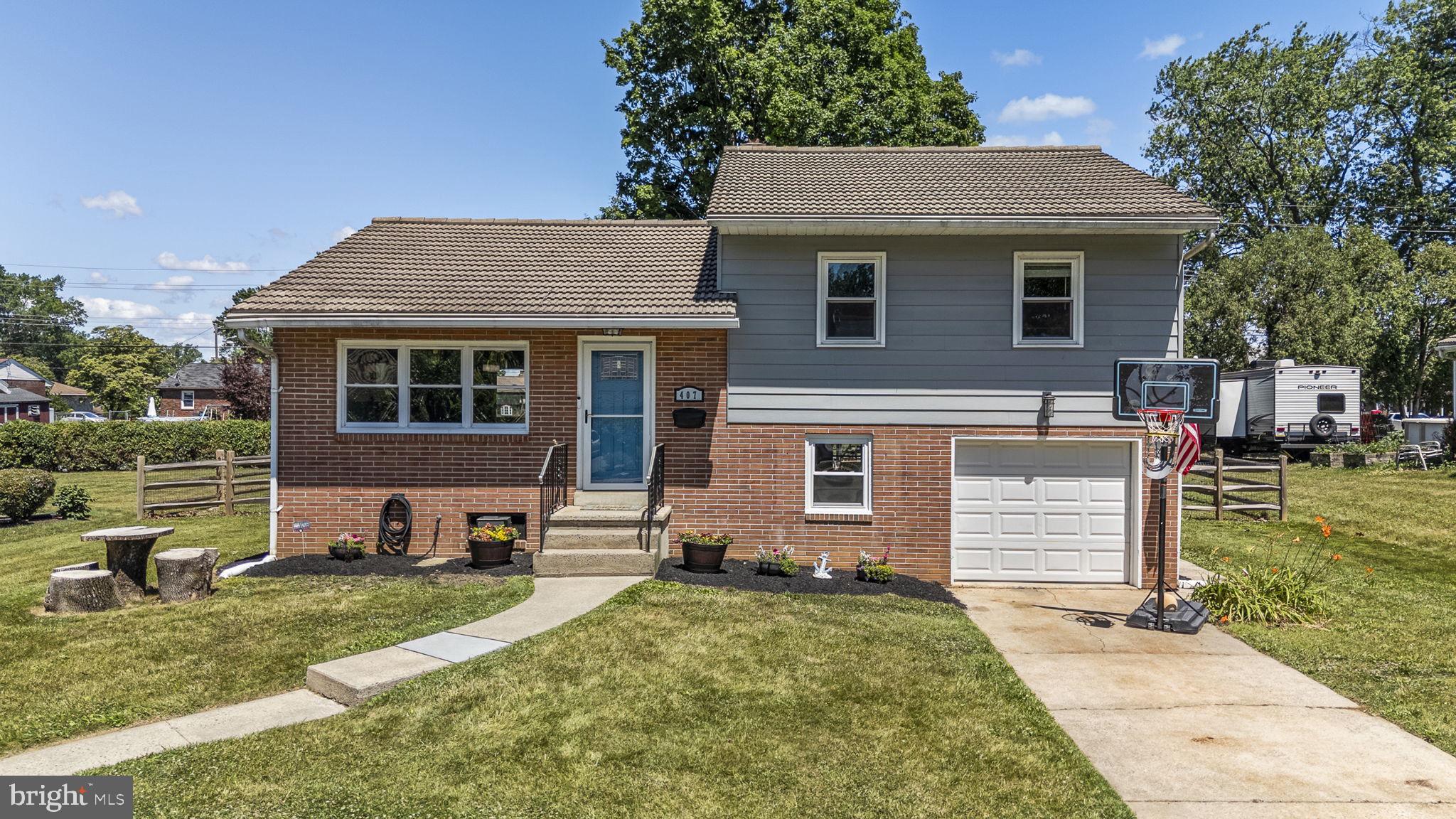 Nestled in the charming Fleetwood neighborhood, this delightful split-level home offers a perfect blend of comfort and community. Built in 1958, this well-maintained residence features 1,508 sq. ft. of inviting living space, including three bedrooms and one and a half bathrooms. The hardwood and tile flooring create a cozy atmosphere throughout. The 0.23-acre lot provides ample outdoor space for relaxation and play. Enjoy the convenience of an attached garage with interior access, making daily life a breeze. Fleetwood is known for its friendly atmosphere, with nearby parks perfect for leisurely strolls or picnics. Local shops and dining options are just a short drive away, enhancing the community feel. This home is not just a place to live; it's a gateway to a vibrant lifestyle in a welcoming neighborhood. Experience the warmth of Fleetwood and make this charming residence your own!