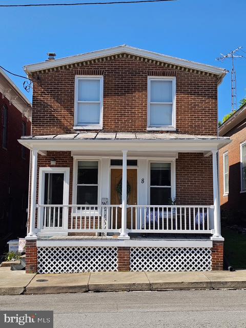 We added a few more photos but Professional Pics will be posted before going live. Welcome to 8 E. Broadway in the heart of Union Bridge! This charming historic home blends timeless character with everyday comfort. Offering 3 bedrooms, 2 full baths, and approximately 1,560 square feet of living space, this home showcases the craftsmanship and charm of a bygone era while providing the conveniences today's buyer's desire. The main level is an Open floor plan with tons of natural light and lots of space unlike most older homes. 

The home's character and warmth are complemented by thoughtful updates like convenience of a first-floor laundry room and a hot water heater replaced in 2020. Step outside to enjoy the fully fenced backyard featuring a patio—an ideal space for relaxing after a long day, entertaining guests, hosting summer cookouts, or simply enjoying your morning coffee.
Situated on a quaint in-town lot, you'll appreciate the small-town atmosphere, walkable location to awesome places like Flood zone Marketplace and Brewery and Original Pizza. Easy access to local shops, parks, schools, and commuter routes. Whether you're looking for your first home, a place to put down roots, or a property filled with character and charm, this Union Bridge gem offers a wonderful opportunity to enjoy small-town living at its finest.