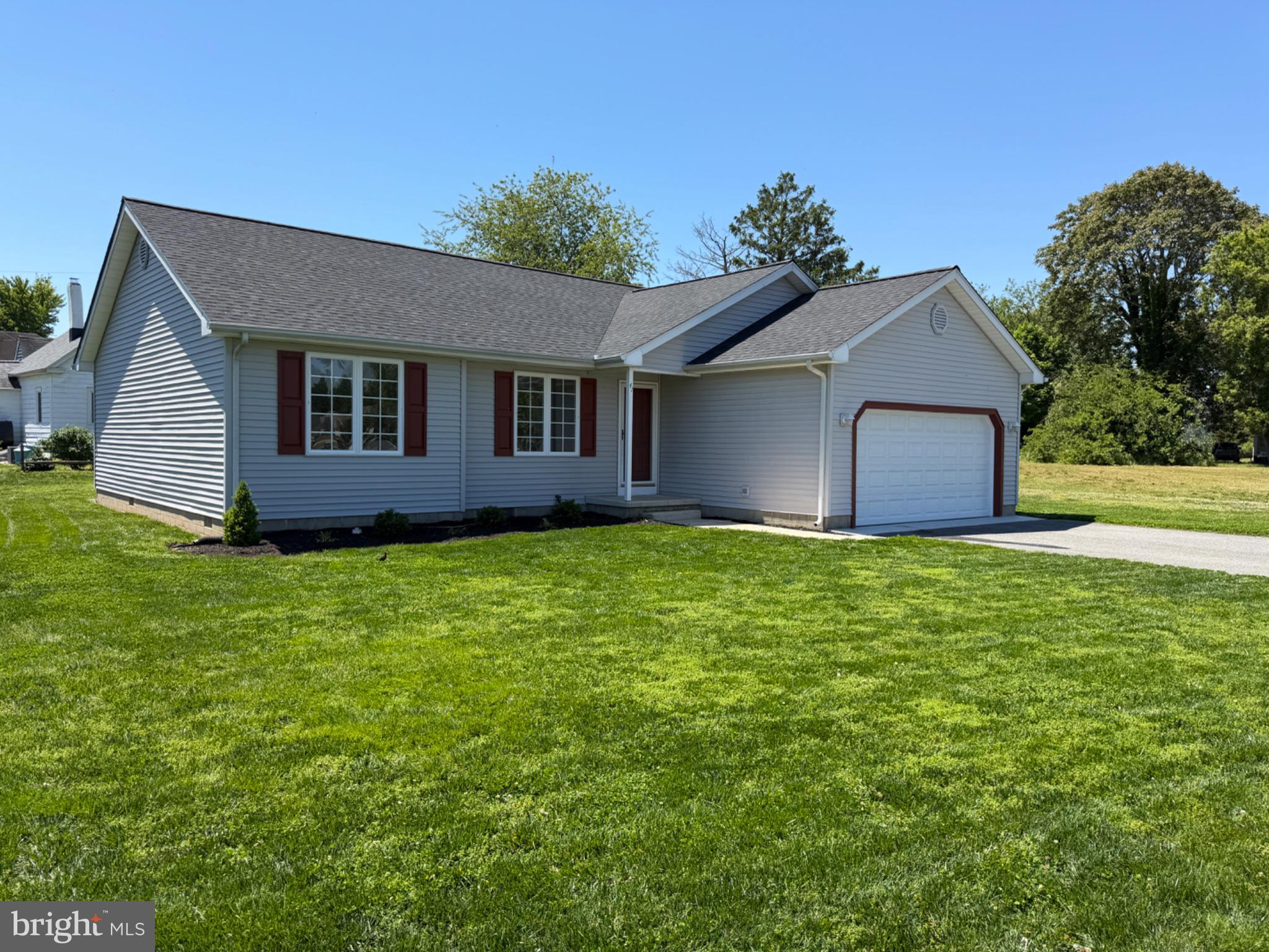 Saw Mill Village is a suburban setting with City Utilities and no HOA fees!  Located near Milford High School & Rt 1/113, this home was built in 2002 by a reputable local builder. Renovated in 2026 inside and out! The vaulted Great Room greets you upon entry. It features an updated kitchen with new granite countertops complementing the Espresso cabinetry. Complete with breakfast bar and dining area.  The open living area floorplan features new Luxury Vinyl Plank flooring; scratch resistant & waterproof. The bedroom wing features three bedrooms with new sculpted carpet. The updated baths are coordinated with matching granite vanity tops and espresso cabinetry.
City sewer, water, trash, recycle, yard waste, electric, & Police Protection are provided by the City of Milford. Taxes stated reflect the County tax.
Brushed Nickel lever door handles throughout. Slider to rear deck and back yard. The updated Primary bathroom & Hall bath feature the granite/espresso cabinet look, complete with refinished fiberglass shower and tub units for easy maintenance. Updated HVAC.  The 2-car garage has a newly installed insulated garage door with quiet Wi-Fi MyQ LiftMaster opener & camera.
Exterior updates include new Tamko Titan XT Architectural roof shingles, concrete garage apron, reseeded lawn, and updated landscaping.   More details in photo captions.