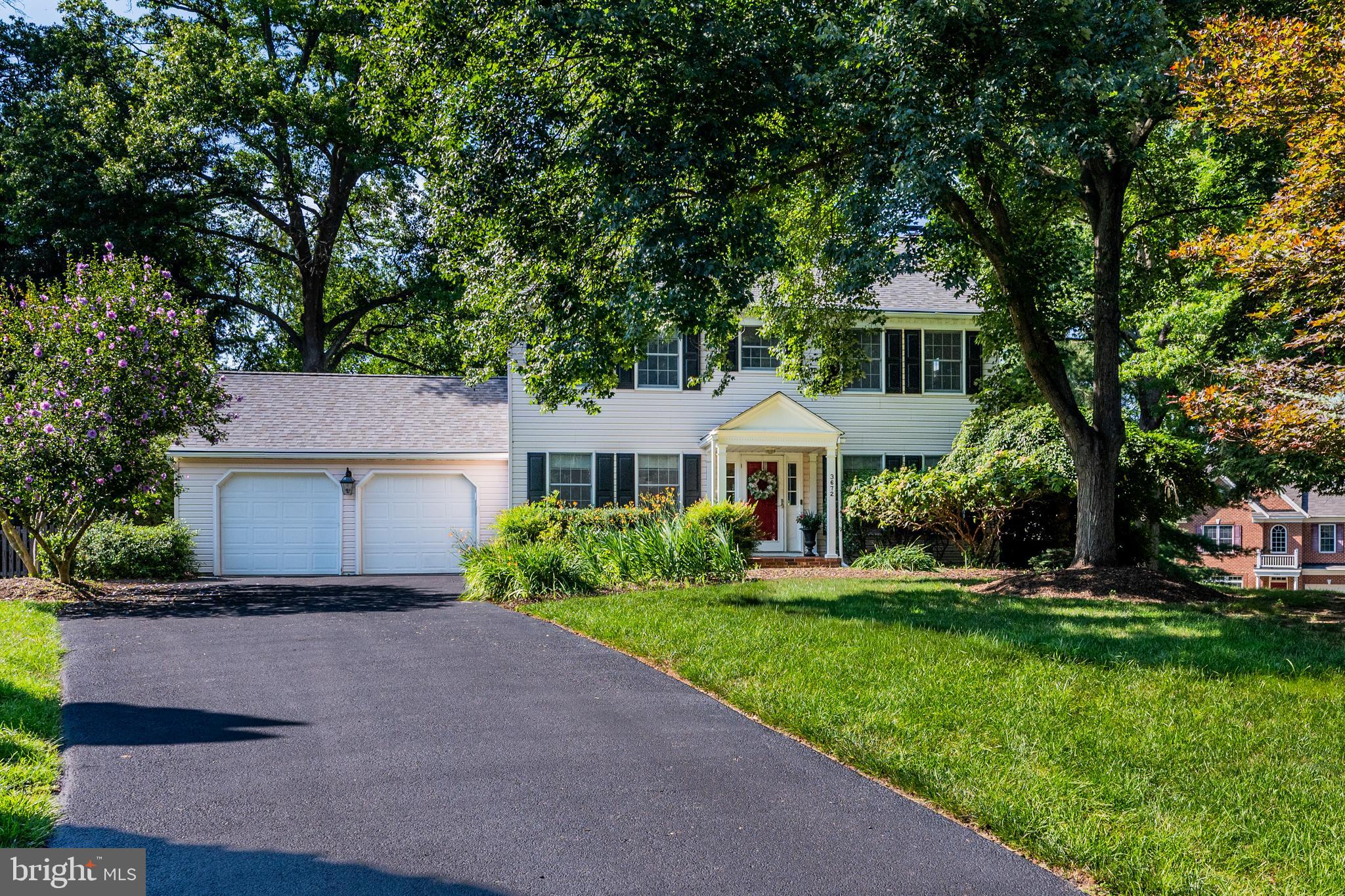 Tucked away at the end of a quiet cul-de-sac in the sought-after Dunloggin neighborhood, this beautifully maintained Colonial offers the perfect blend of space, warmth, and everyday functionality on a peaceful half-acre homesite backing to trees. Surrounded by mature landscaping and gorgeous gardens, the fully fenced backyard creates a private outdoor retreat ideal for entertaining, relaxing under the covered deck, or simply enjoying nature with pets and family. Inside, hardwood floors flow throughout the main level, where the heart of the home is the beautifully designed kitchen featuring granite countertops, an island, Bosch appliances, and an open flow into the inviting family room with a wood-burning fireplace recently serviced and re-lined for peace of mind. Upstairs, the spacious primary suite offers a beautifully updated bathroom with a large shower, creating a true retreat at the end of the day. The fully finished lower level provides exceptional flexibility with durable LVT flooring, abundant natural light, a spacious recreation area, walk-out slider to the backyard, and an impressive amount of storage space. Additional features include Anderson windows, a new roof in 2020 with 50-year architectural shingles, and a new fence installed in 2023. Ideally located just minutes from Route 29, major commuter routes, shopping, dining, and everything Ellicott City has to offer, this is the kind of home that combines timeless charm, thoughtful updates, and a setting that simply feels special.