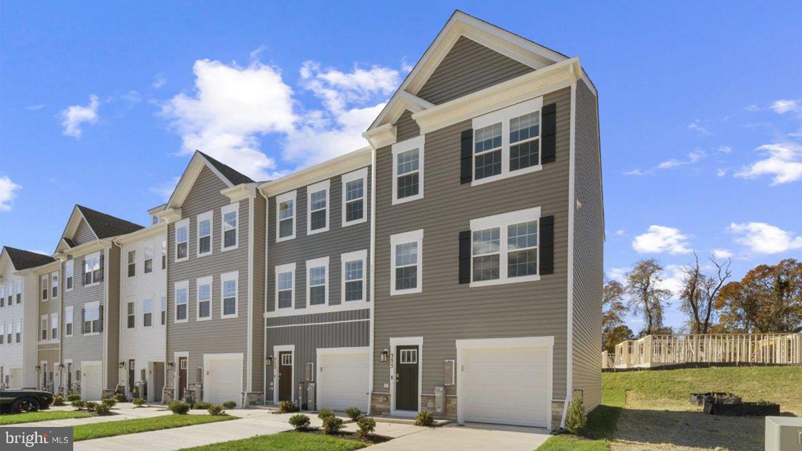 This breathtaking open concept layout features 3 stories, 3 bedrooms, 2.5 bathrooms, and a garage for 1 car. Spanning 1,969 sq. ft. of versatile living space, the Lafayette truly encompasses all your needs. Enter through your inviting foyer that leads to a spacious recreational space. You have the flexibility to transform your den into an office, media room, or playroom! Ascend to the main level where the living and dining spaces are accentuated by recessed lighting and a roomy eat-in island, perfect for entertaining friends and family. Just past the main level's powder room, an open staircase takes you to three bedrooms, all conveniently situated near the laundry closet and the second bathroom. Your primary bedroom sanctuary awaits, featuring a gorgeous walk-in shower, dual sinks, and a generous walk-in closet. Simplify your life with D.R. Horton's AMERICA'S SMART HOME(R) technology, which includes remote keyless entry, a SkyBell video doorbell, and much more!