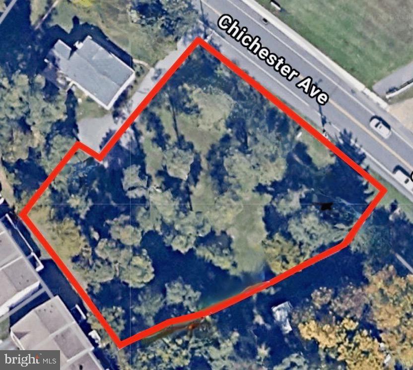 Commercial lot with approved building plans.  +/- a half an acre of prime real estate.  C-1 zoning with many permitted uses; Retail, Office, Trades/Contractor shop and more.  Excellent location, visibility and access.  Situated on  bustling  Chichester Ave. with approximately 160 feet of frontage.  Current plans are for +/- 3,000 SF , 2 story building with grade access on each floor.