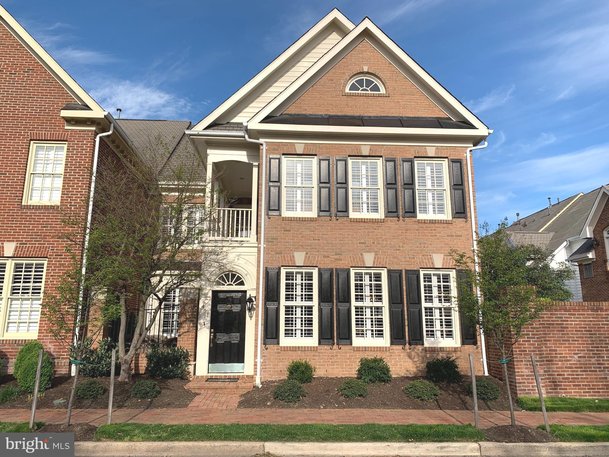 Stately Charleston-Style Home on the outside - exquisitely remodeled with premium features and finishes on the inside.  Enter this amazing home through the private courtyard designed for outdoor dining.Open concept living/dining room with gorgeous new hardwood floors, large windows and plantation shutters provide a wonderful flow for entertaining.  Relax in your sleek family room with linear electric fireplace, built-ins & specialty lighting.  Just a few steps past the elegant powder room, enter the glamorous gourmet kitchen complete with Cambria quartz counters and oversized island, Italian porcelain flooring, custom cabinets and deep drawers, sparkling chandeliers and above and below cabinet lighting.  The adjoining beverage center with glass cabinets, beverage refrigerator, wet-bar sink, and walk-in butler's pantry adds to the ease of entertaining.  The sunny patio off of the kitchen and a two-car garage with built-in cabinets finish off the first level.  Now...take 16 steps to the second floor of this lovely home to the expansive master suite complete with sitting room, beautifully remodeled bath, custom walk-in closet, laundry room and balcony overlooking the courtyard.  Two guest rooms, one with high ceilings and four closets, & one used as an office with a walk-in closet, along with a stunning guest bath complete the interior of this absolutely perfect home.  Walk to King Street Metro, Whole Foods and Old Town's shops and restaurants.  Community salt-water pool, fitness center, events and activities make this a great place to call home!