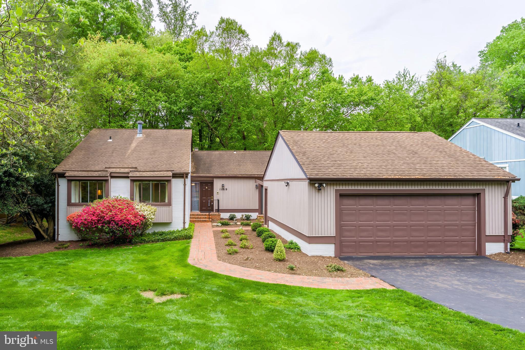 Welcome home to Fox Mill Woods, one of Reston’s most sought-after communities. This well-maintained home offers the rare convenience of main-level living, with three bedrooms and two full baths, along with a traditional living room, dining room, and a kitchen that opens to a cozy family room with fireplace.

A spacious deck overlooks the fully fenced backyard, perfect for relaxing or entertaining. The lower level adds incredible flexibility, featuring a large rec room with a second (gas) fireplace, a fourth bedroom, full bath, and a separate office/den, plus multiple walk-outs to the beautifully landscaped rear yard and garden.

Additional highlights include a two-car garage and a location that’s hard to beat—students can walk to highly regarded Crossfield Elementary. Fox Mill Woods is not part of Reston Association (no HOA fees), and residents have the option to join the neighborhood swim and tennis club.