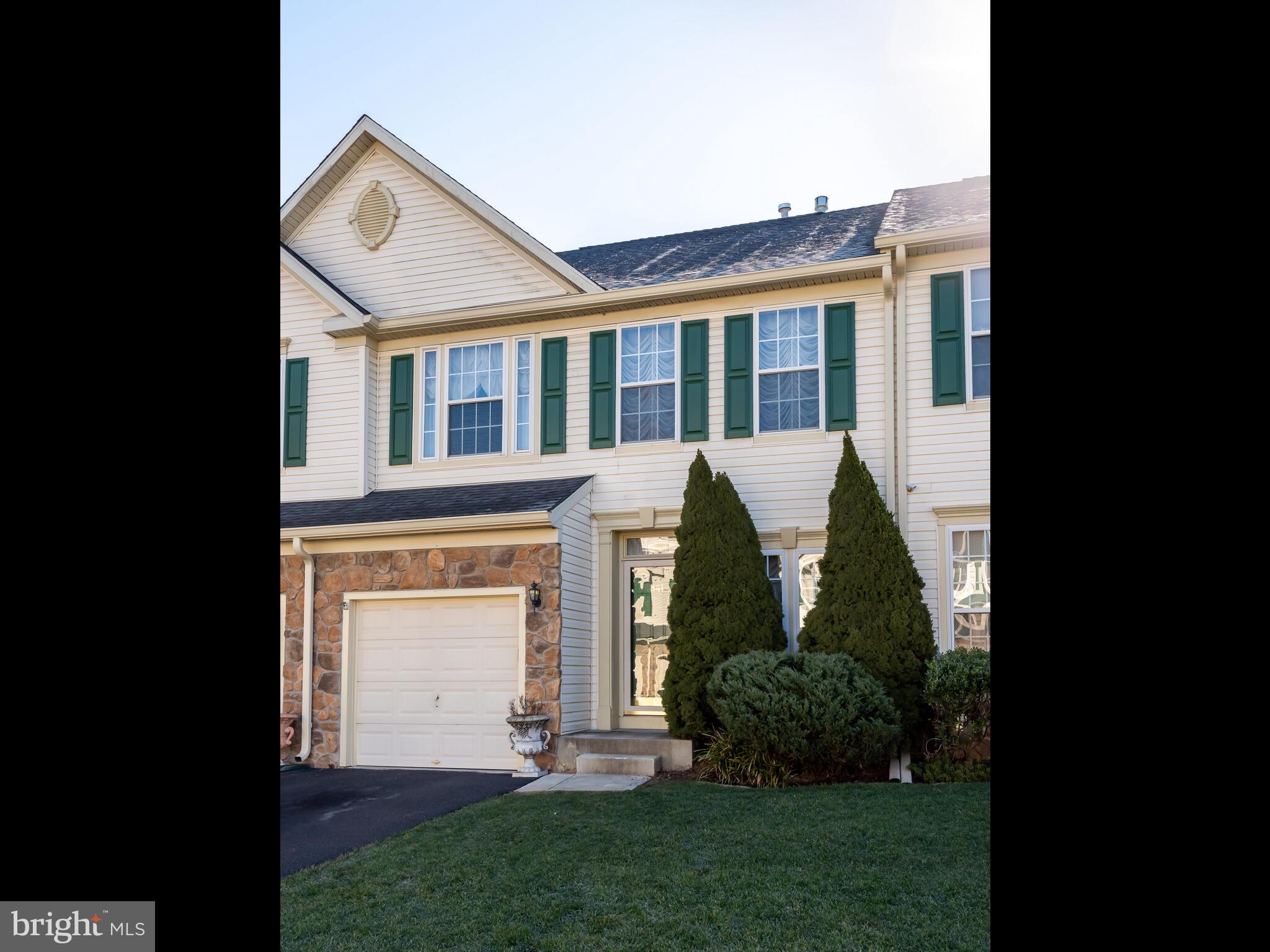 Welcome to 841 Geranium Drive, a 3 bedroom and 2.2 bath interior unit in the highly desired 55+ community of Bluestone Creek. This home features 3,390 sqft of living area, soaring and sun-filled spaces, a first floor owner’s suite, and a low maintenance lifestyle just minutes from everything you need. Enter the home to find the great room heightened by 2 story ceilings that open to the upper level, and brimming with natural light, hardwood floors, and a focal gas fireplace. A formal dining area flows into the spacious kitchen with plenty of cabinetry and counter space for the home chef and opens to a breakfast area with rear deck access. The owner’s suite is conveniently located on the first floor and offers a walk-in closet and an attached en suite bath with dual vanity and glass shower. The upper level boasts an open loft area and 2 generously sized bedrooms sharing a hall bath with double vanity and tub/shower combo. The huge lower level has a large family room, half bath, laundry, and plenty of storage space. Conveniently located near the Shops at Valley Square, Graeme Park, and both Five Ponds and Fairways Golf Courses this home has so much to offer!