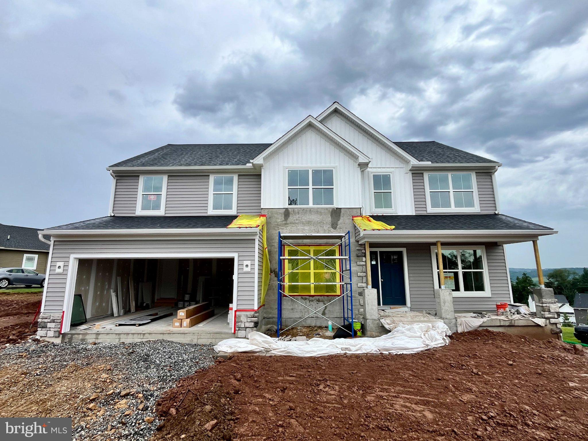 Home is close to complete and move in before the school year starts! 

Flex Cash Get $5,000 Flex Cash on select Quick Move-In Homes — apply it where it matters most. Less stress, more clarity at closing. Expires 6/30/2026. See Agent for details.

Welcome to this inviting Beacon Pointe home in the Spring Forge community — a thoughtfully designed two‑story layout that feels instantly warm and welcoming. The exterior features stone accents setting the tone for a home that has been carefully finished with comfort in mind.
Inside, the main level offers a bright, open flow with upgraded flooring, a cozy family room with added windows for natural light, and a dedicated study that creates a quiet space for work or relaxation. The kitchen brings everyone together with upgraded cabinetry, quartz counters, stainless steel appliances, and a tile backsplash, all blending into a warm, livable space you’ll enjoy every day.
Upstairs, you’ll find a versatile loft along with comfortable bedrooms designed for easy living. The primary suite includes a walk‑in closet and a nicely finished private bath with a raised quartz vanity and a semi‑frameless shower door. The hall bath features upgraded fixtures, and the second‑floor laundry adds daily convenience.
The daylight walkout basement gives you room to grow — perfect for future finishing or simply excellent storage — and includes a three‑piece bath rough‑in, media chase, and the Manabloc plumbing system. Outdoors, a 12' x 12' composite deck provides a relaxing place to enjoy morning coffee or evening sunsets. Practical touches like keyless garage entry, upgraded lighting, and a walk‑in pantry make everyday life easier and more enjoyable.
This  Beacon Pointe brings together comfort, functionality, and a warm sense of home — a wonderful option in the popular Spring Forge community.

Staged or digitally enhanced photos may be used. Taxes are based on land only and will be reassessed after construction.