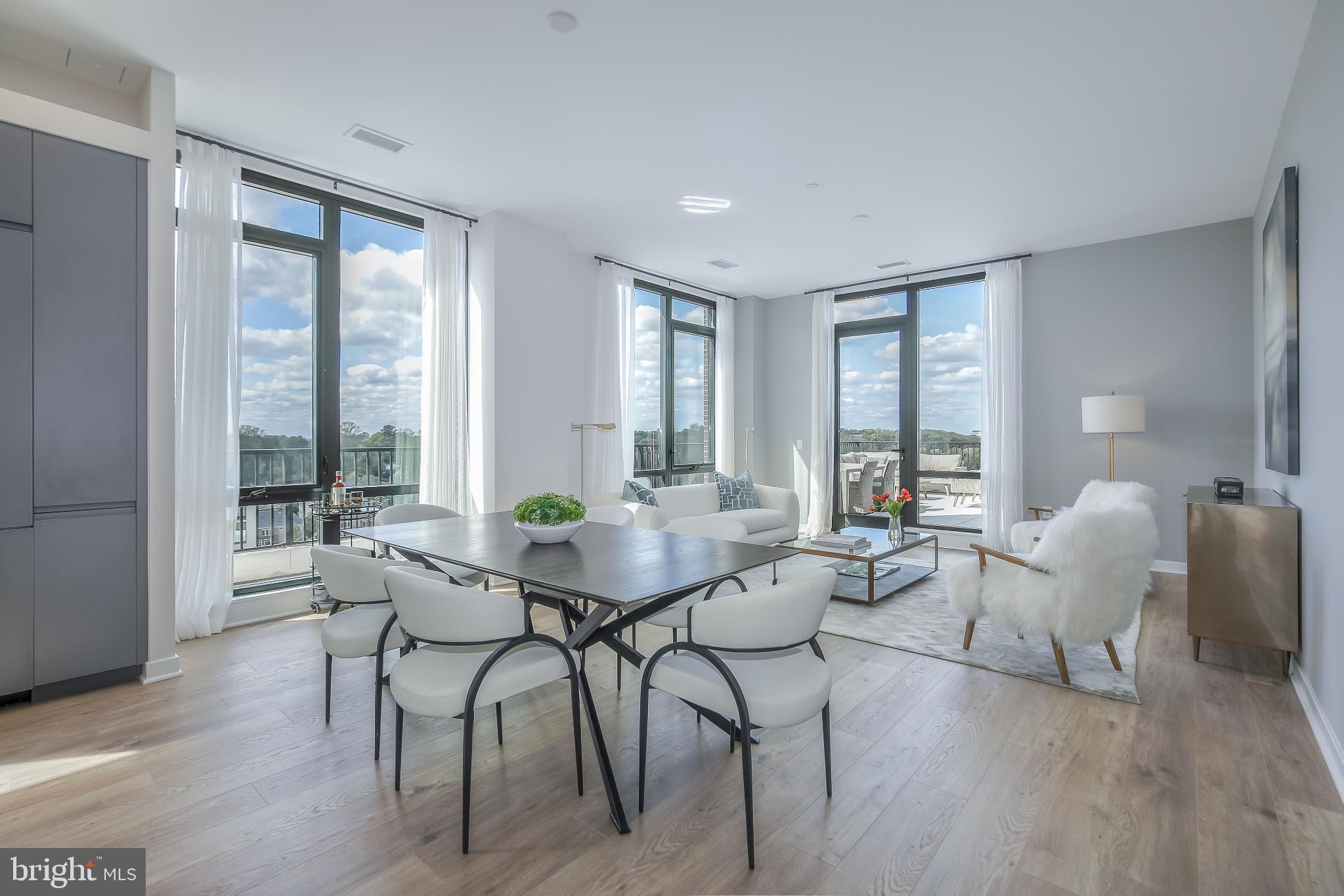 Schedule an appointment to tour The Oak, now over 60% sold and "move-in" ready.  

Unit PH9 is a generous 2BD, Den, 2.5BA corner penthouse unit with an outdoor terrace and includes 2 parking spaces.  This unit has an open floorplan, two-tone European inspired frameless kitchen cabinetry, matte black hardware and fixtures, quartz countertops, tile kitchen backsplashes, kitchen islands, ENERGY STAR® Bosch kitchen appliances, full-size GE washer/dryers, LED light fixtures, Porcelanosa wide-plank wood-style flooring, high ceilings and expansive windows. 

Building Amenities Include: 5,000 SF outdoor terrace with gas grills, bar seating, dining and lawn, cozy penthouse terrace with dining and lounge seating, residents’ lounge with fireplace, lounge and communal dining, fitness center with cardio equipment and free weights, 24-hour front desk, secure bike storage, car detailing station, and pet washing station.