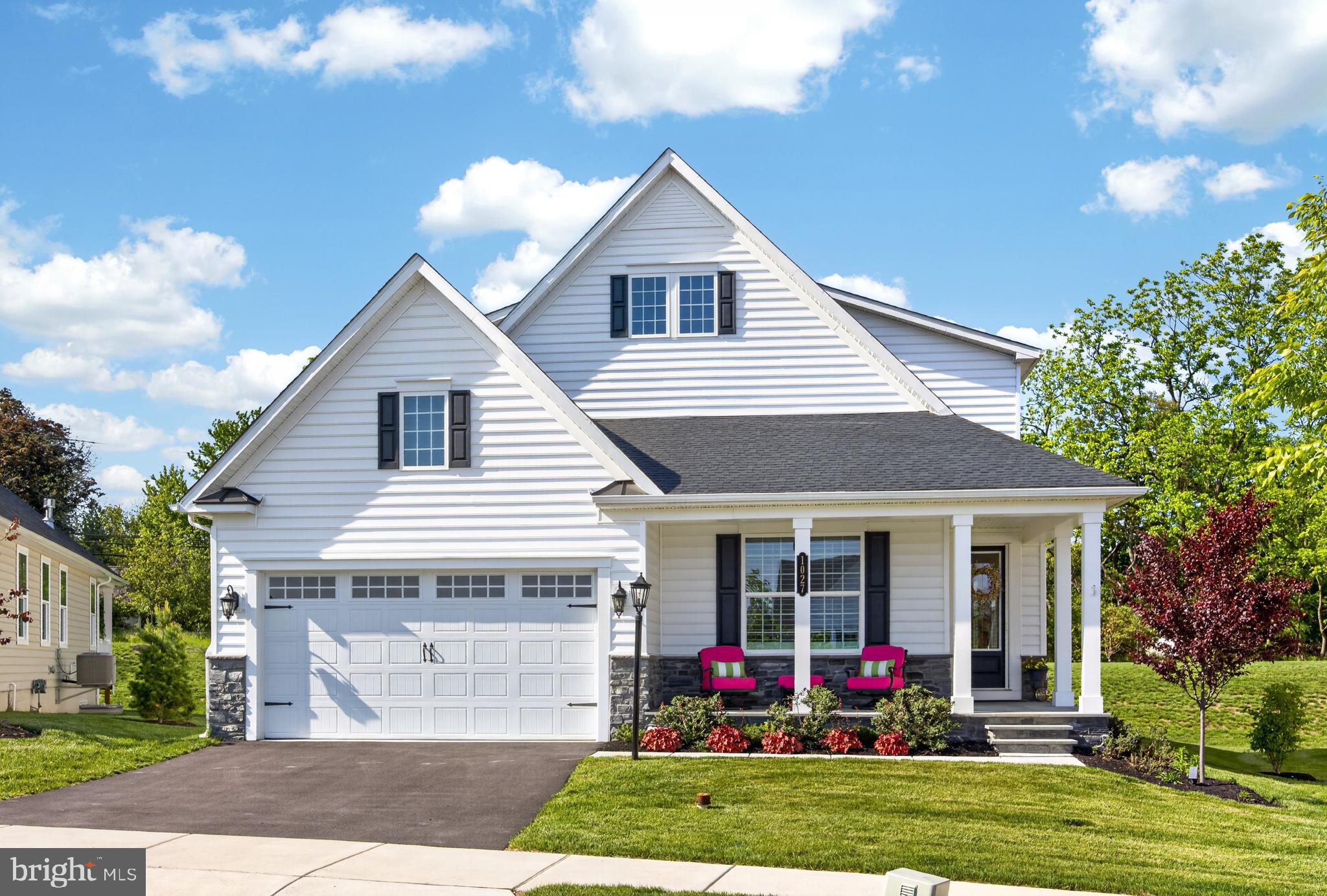 Tucked away on a quiet enclave within the sought-after Greystone community in West Goshen, this stunning 4-bedroom, 4-bath NV Homes Clarkson model sits on a premium lot with no through traffic, offering both privacy and a peaceful setting.
Built less than two years ago and thoughtfully enhanced well beyond the builder’s model, this home is filled with elegant upgrades, custom finishes, and beautiful crown molding and detailed woodworking throughout.

The main level features a bright, open layout with wide plank flooring, a spacious living area, and a beautifully designed kitchen with an oversized island, upgraded cabinetry, stainless steel appliances, and a clean, timeless aesthetic that flows seamlessly into the dining and gathering spaces. Natural light pours in through multiple windows, creating a warm and inviting atmosphere.

The main floor primary suite offers a true retreat, highlighted by a tray ceiling, generous proportions, and a spa-like bath with a double vanity, sleek finishes, and a large glass-enclosed shower. Two additional well-sized bedrooms - one on the main level and one on the upper floor - provide comfort and flexibility. The upper level continues to impress with a bright, spacious loft perfect for relaxing or entertaining, along with a versatile bonus room ideal for a study, gym, media room, or creative space.

The fully finished lower level is an entertainer’s dream, complete with a custom-built bar featuring cabinetry, sink, refrigerator, and dishwasher, along with multiple areas for lounging, dining, or hosting. An additional finished room provides the fourth bedroom along with a full bathroom, making it ideal for guests, extended stays, or a private retreat.

Step outside to enjoy the expansive rear deck with a covered section and electronic awning, perfect for relaxing or entertaining while overlooking the backyard.

One of the standout features of this home is the fully paid $50,000 Neighborhood Improvement District (NID), offering significant savings compared to other homes in the community.

With its premium location, thoughtful upgrades, and move-in ready condition, this home offers a level of finish and comfort that truly stands apart.