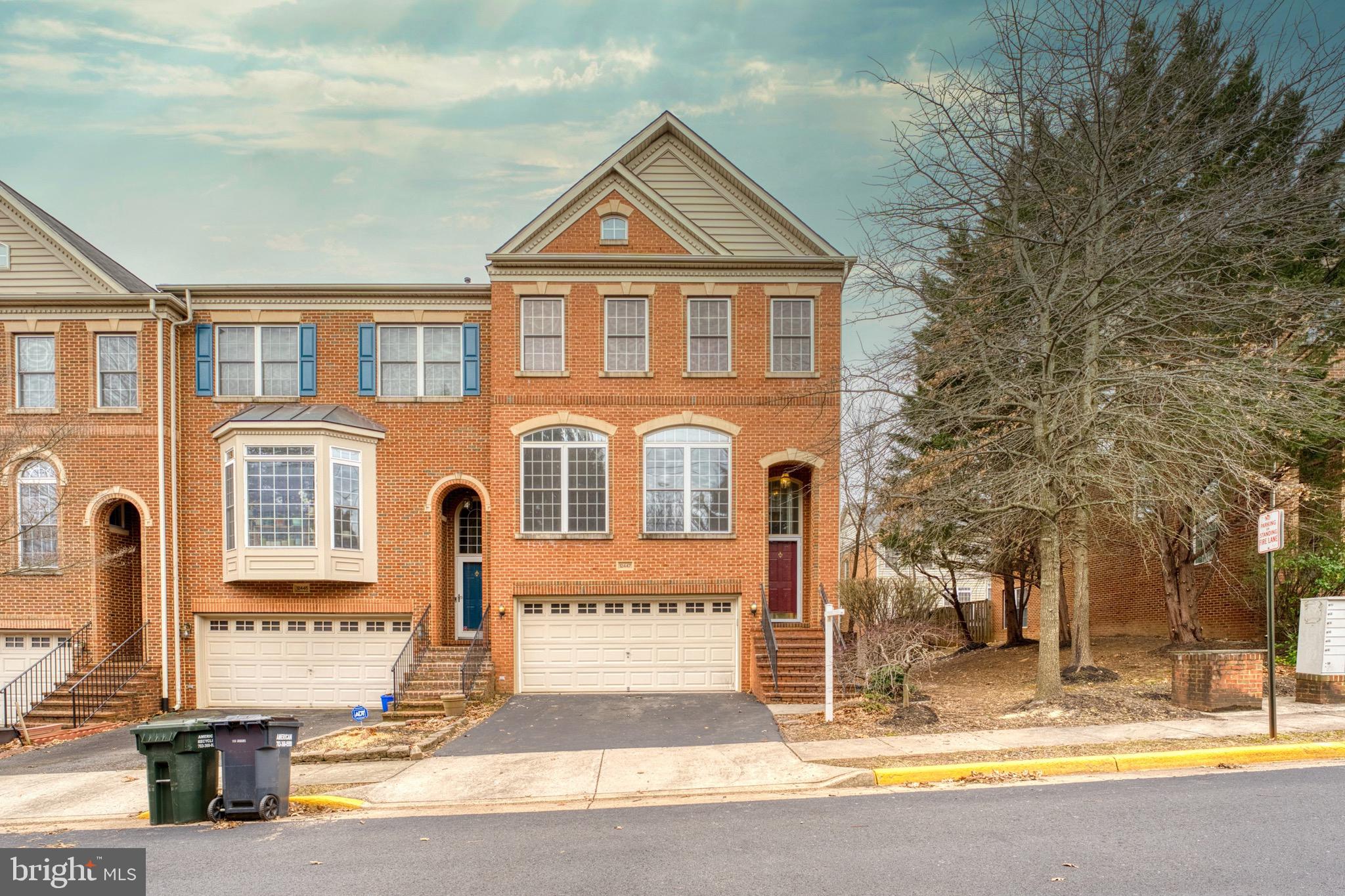 Stunning, bright, & spacious 3 level brick front large townhome in highly sought after Stone Creek Crossing in Fairfax features “2 Master bedroom “3.5 bathroom, and 2-car attached garage.  This luxury town home is the hub of convenient living!  Main level boasts of gleaming hardwood floors,  gourmet kitchen  with high end stainless steel appliances, recess lighting, spacious dining room, large family room with fire place, and a newer trex deck on the main level.  Main level bump out makes it one of the largest models in the neighborhood. Custom designed closets Luxurious master suite, with a spacious walk-in closet, master bathroom with dual vanity. Second “Master bedroom” & a second bath room on the upper level.  Hardwood floor throughout, fresh paint, New wall oven, New washer and dryer.  Lower level with a large rec room, full bathroom. Lowe level can be used for "3rd" bedroom. Community offers 3 Tot lots, trail, & ample guest parking.  Conveniently located near Harris Teeter, Whole Foods, Wegmans, Fair Oaks Mall, restaurants, shopping & major commuter routes like I-66, Rt 50, Rt 29, & FFX County Parkway. It's a commuters paradise.  This townhome offers a perfect blend of style, functionality & a convenient location. It is ideal for the family who wants a beautiful home with easy access to all Fairfax offers. This one has it all!!