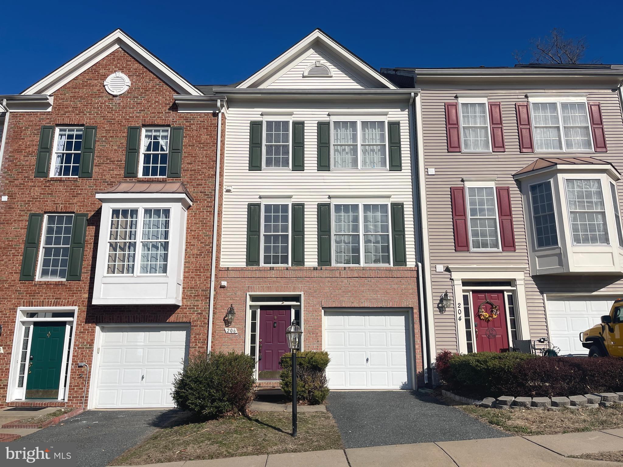 Beautiful three bedroom townhouse in central Stafford.  Close to everything.  Short drive to Quantico and Fredericksburg.  Handy to commuter lots, shops, restaurants, and schools.  Three fully finished levels.   Open and bright.  Main level has spacious kitchen with room for dining table and stainless steel appliances.  Rear door from kitchen leads to deck, excellent for grilling and entertaining.  Backs to trees.  Huge open family room off of kitchen tons of natural light.  Enjoy a second family room or recreation room and half bath in the basement.  Endless possibilities.  Three bedrooms upstairs.  Large master with bath, double vanities.  Plenty of parking and one car garage, driveway.  Perfect location, make this your new home today.