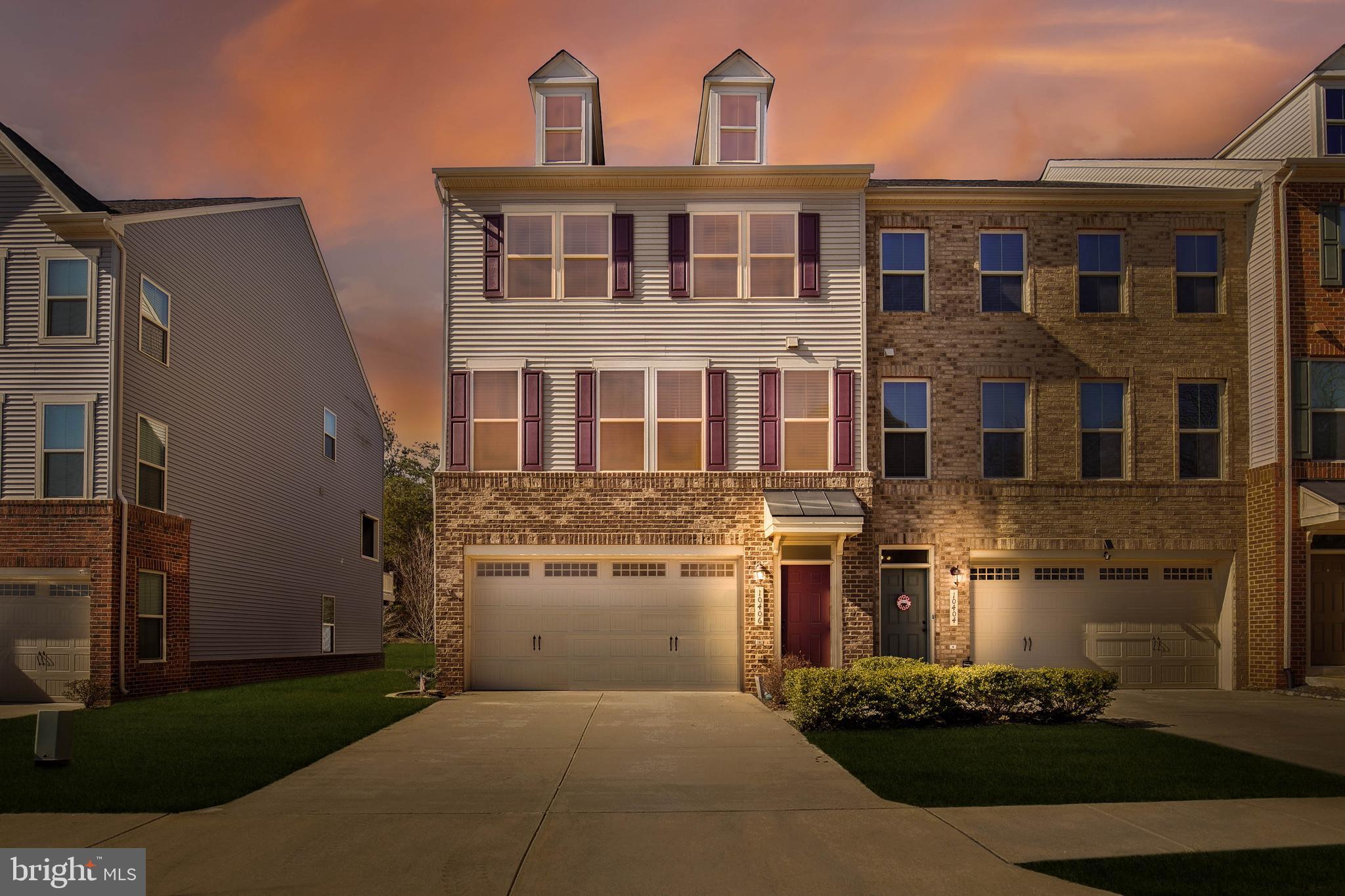 Welcome to 10406 Steeplechase Run Lane, an elegant end-unit townhome in the heart of Manassas. Spanning 2,676 square feet across three levels, this home blends style and functionality.  

The open-concept main level features a gourmet kitchen with granite countertops, an oversized island, and contemporary lighting, flowing seamlessly into a bright living area. Step onto the covered deck to enjoy tranquil, tree-lined views.  

Upstairs, the expansive primary suite boasts a walk-in closet and en-suite bath. Two additional bedrooms, a shared bath, and a convenient laundry room complete this level.  

The lower level offers a spacious family room, full bath, and mudroom with garage access. Outside, a private backyard oasis includes a covered porch, double deck, mature trees, and a charming fire pit.  

Located in a vibrant community, residents enjoy a private splash park, playgrounds, and recreational fields. Just minutes from shopping, dining, Old Town Manassas, and major commuter routes, this home is a rare find. Recent updates include a newer hot water heater (2021), vinyl fence (2020), lower deck (2021), modern lighting (2022), and fresh paint throughout. Don’t miss this opportunity!