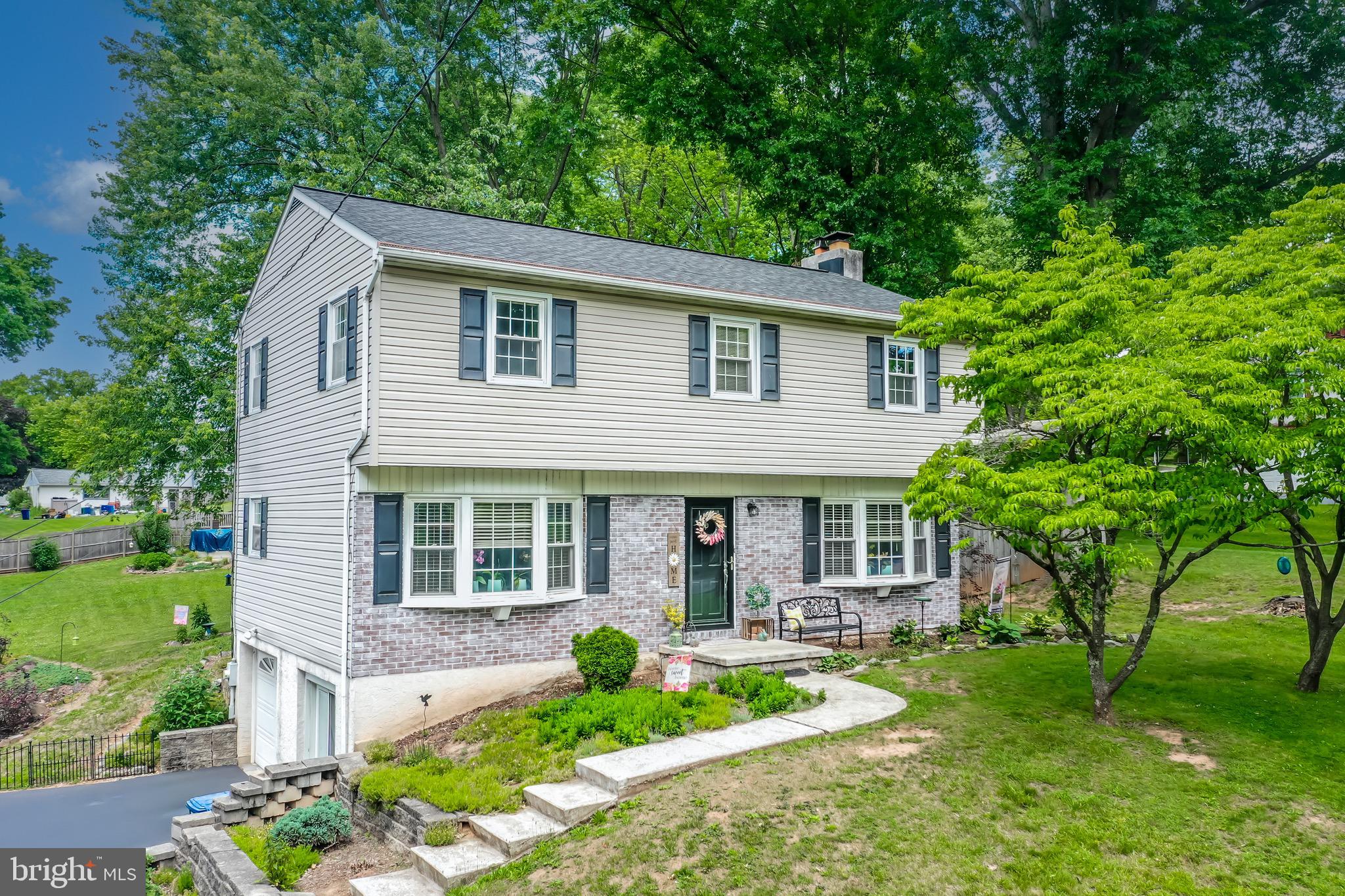 Here's a great opportunity for a well-maintained single home with a private, back yard and pool! As you approach the property, you'll first notice the new, expanded and freshly paved driveway that leads to an oversized, detached 2-car garage just waiting for your cars, toys or just a ton of extra storage space! Conduit has been run to this garage and ready for electric to make it even better! As you enter the front door, you'll see a large living room to your right which includes a wood-burning fireplace with a brick surround. Plenty of windows make this a great spot to entertain or sit quietly. On the other side of the foyer, you'll see the dining room with chandelier, crown molding and chair rail. This room then enters the large kitchen that's perfect for any chef and includes stainless steel appliances. The kitchen leads directly to the huge deck which is where you'll spend the whole summer as you enjoy the private, fenced yard and 18' above-ground pool (new filter and pump installed in 2025). Let's go back inside to finish the tour as you head upstairs. The primary bedroom has a private bathroom with shower and pedestal sink. Three other bedrooms are nicely-sized and bedroom #3 had new carpet installed recently. Finally, check out the lower level which is partially finished with 5' French Doors that walk out to the driveway. There's more storage space as well as the utility room with washer and dryer (included!). Other notable remarks include a newer roof (2022 with 30-year shingles), hookup for a generator, replacement windows throughout and hot water baseboard heat. This home was appraised in late 2025 for $495,000 so we are priced to sell! Please don't hesitate to book your showing then bring your best offer! All furniture left in this home is negotiable.