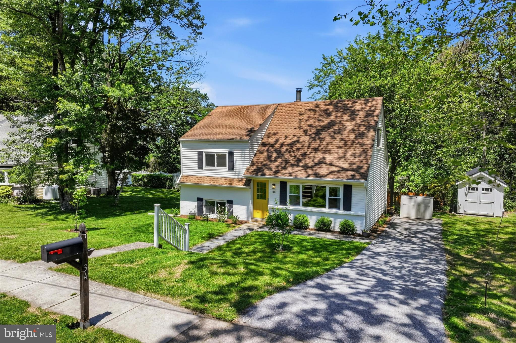 Welcome to 34 Sunset Drive, a beautifully updated home tucked away on a quiet street in the heart of Paoli. Offering three bedrooms, two full bathrooms, and a versatile multi-level floor plan, this home combines modern updates with a highly convenient location in the sought-after Great Valley School District. The main level features a bright and inviting living area accented by restored hardwood flooring and abundant natural light. The thoughtfully renovated kitchen serves as the heart of the home, showcasing custom cabinetry, quartz countertops, stainless steel appliances, recessed lighting, and ample workspace for everyday living and entertaining. Just off the kitchen, step outside through the newer Pella sliding glass door to a spacious deck overlooking the Chester Valley—an ideal setting for outdoor dining, gatherings, or simply enjoying the sunset and change of seasons. Three generously sized bedrooms and an updated, full bathroom are located on the upper levels. The lower level offers another updated, full bathroom and flexibility with potential for a fourth bedroom, guest suite, or home office. Extensively improved over the past several years, the home benefits from newer windows, a complete kitchen renovation, remodeled bathrooms, upgraded electrical service with a 200-amp panel, heat pump and central air system, restored hardwood flooring, luxury vinyl flooring, gutters, exterior doors, fencing, deck, front walkway, and fresh interior finishes. More recent updates include a storage shed with dedicated shed pad, new water heater, new exterior vinyl siding, upgraded attic and crawlspace insulation, and a Pella sliding glass door, providing additional value and peace of mind for the next owner. Conveniently situated less than one mile from both the Paoli Train Station and Paoli Hospital, this location offers easy access to major commuter routes, local shopping, restaurants, parks, and everyday amenities. Whether commuting to Philadelphia, enjoying the Main Line lifestyle, or simply looking for a move-in ready home in an established neighborhood, 34 Sunset Drive presents an exceptional opportunity.