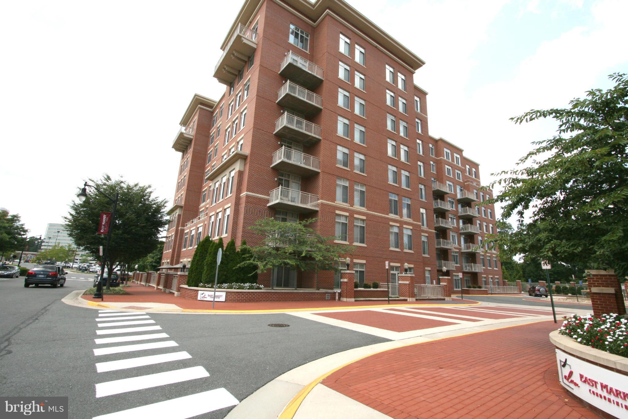 UNDER CONTRACT - Stunning Mid-rise condos next to Whole Foods, 10 foot Ceilings with exposed ducts, 2 BR, 2 BA, 1,138 sf, Balcony, Hardwood in Main Areas, New Carpet in Bedrooms, Corner with East & North Exposure, Trees, Fountain & Pool View, 2 garage spaces, Onsite Fitness center & Billards/Party room, Condo fee $443/mo, Built in 2007, Free Shuttle to Vienna Metro, Adjacent dining. Hurry!