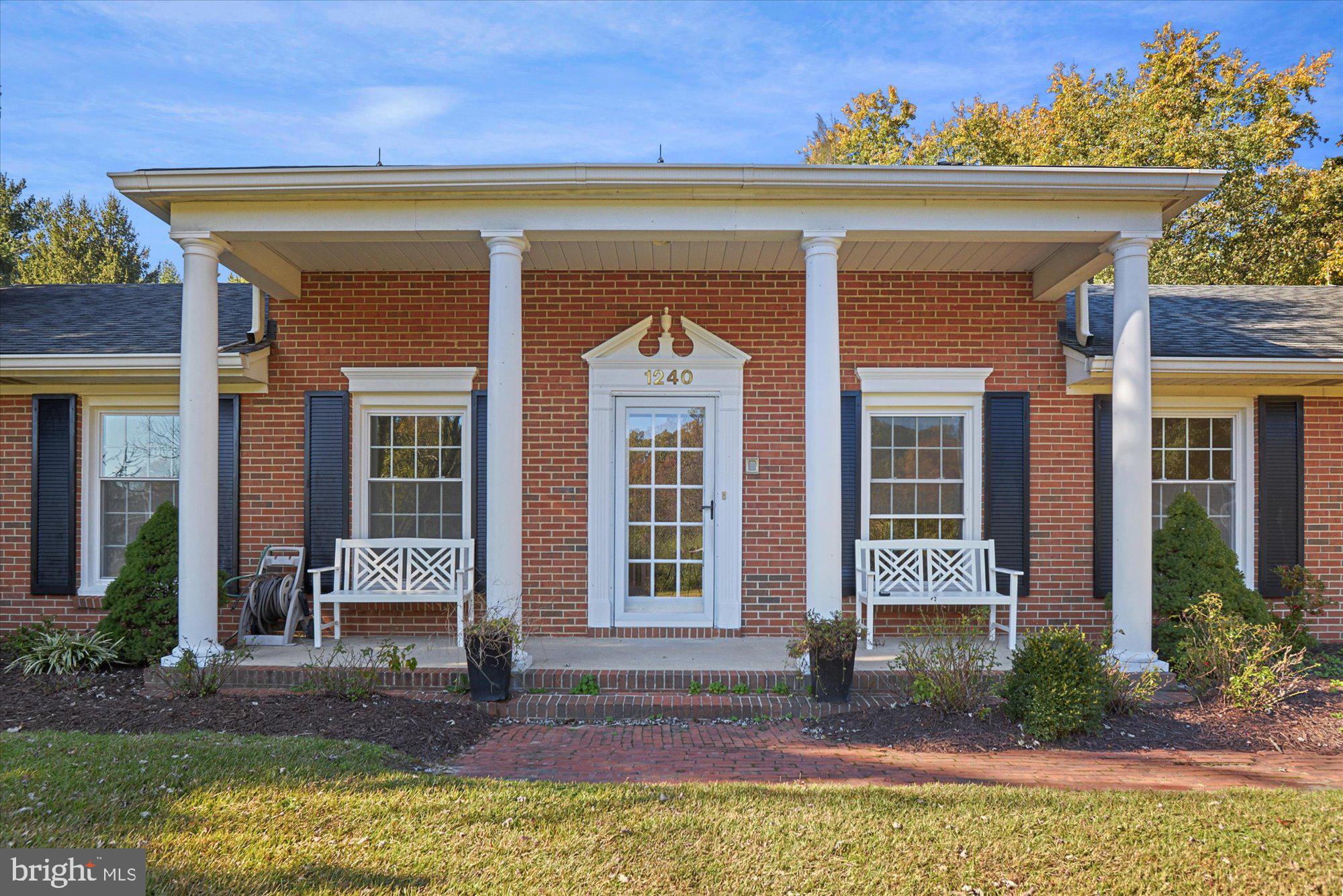 Welcome home to this beautiful 5-bedroom brick rancher boasting superb curb appeal and nestled on just over 3 Acres of peaceful, private, tranquil, nature-filled, and beautifully landscaped surroundings all within the Sunshine Acres community of Huntingtown. Hardwood floors sprawl throughout the freshly painted main level whose centerpiece is a dual-sided wood-burning brick fireplace with family rooms either side and leading to a dining room and newly renovated kitchen with stainless steel appliances and granite counter tops and tons and tons of lovely cabinetry space. There is a small breakfast nook off the kitchen with a bay window that looks out onto the amazing backyard. The main level also boasts 3 large newly carpeted bedrooms to include the owners’ suite with en suite bathroom and a separate family bathroom and a bonus room. Downstairs in the basement you will find a large recreation room with a lovely brick-mantled fireplace and wet bar ideal for entertaining. There are two generously sized bedrooms with nice wood floors and another full bathroom and a laundry room with tons of shelving and storage space. The long driveway from the very quiet Neptune Lane leads to tons and tons of parking space for your family or guests and the adjacent historic barn adds to the picturesque ambience of this amazing property. Relax on the front porch and watch the sunrise over your wonderful, detached family home and enjoy everything it has to offer