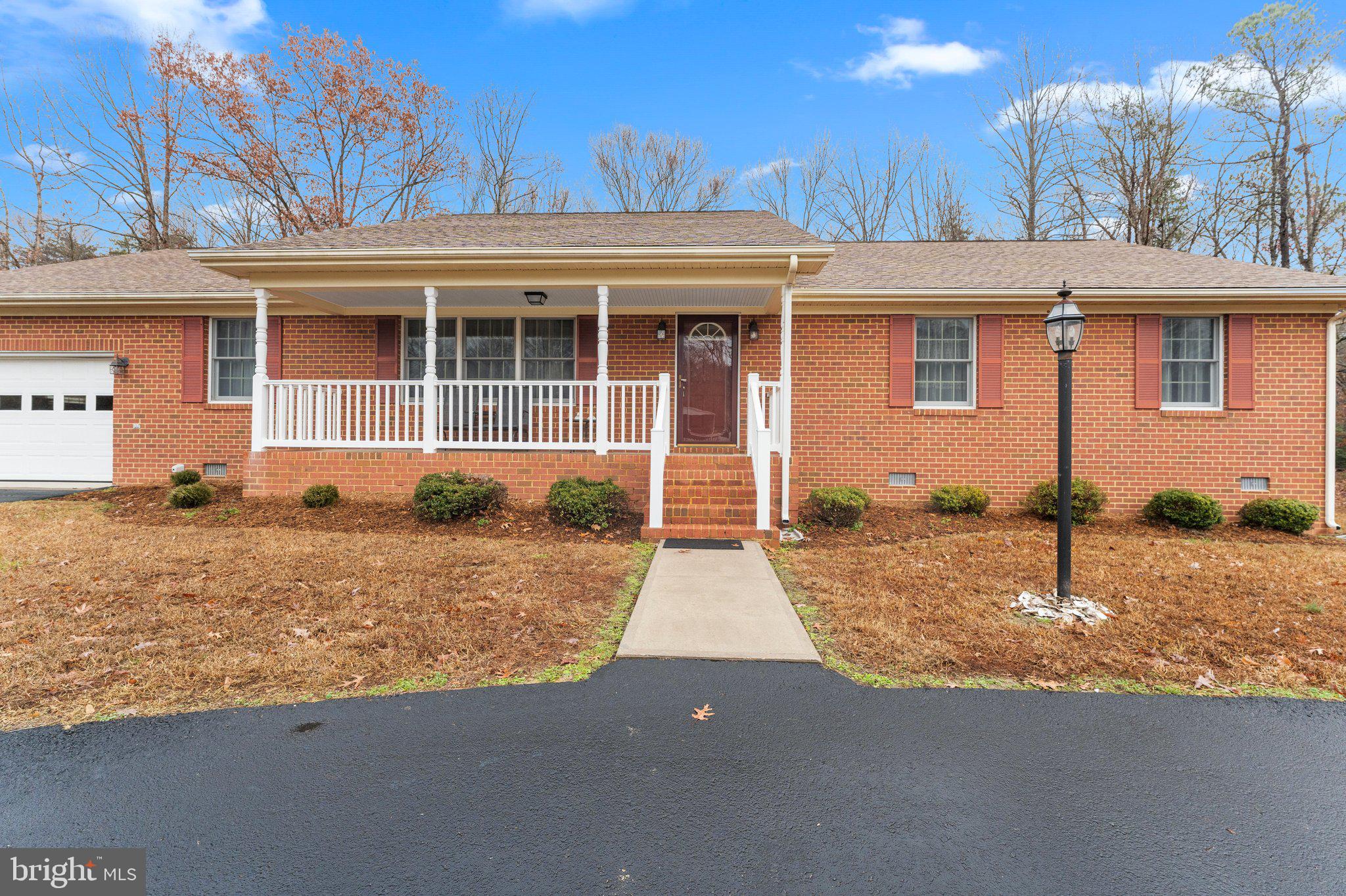 Check out this 3-bedroom, 2.5-bath brick rancher located in the Town of Warsaw. From the moment you step into the inviting front foyer, you'll feel at home. The freshly painted, spacious great room offers a comfortable space for relaxing or entertaining, while the formal dining room is perfect for hosting family gatherings. The kitchen boasts ample cabinet space, a built-in desk, and plenty of room for meal prep. Conveniently located off the kitchen, you’ll find a laundry room, half bath, garage entrance, and access to the back deck.  Outside, enjoy your morning coffee on the covered front porch or host gatherings on the back deck, overlooking the peaceful backyard.  The paved circular driveway adds curb appeal and easy access, while the whole-house generator ensures peace of mind during any power outages.  There is a shed for storage.  Best of all, you’re within walking distance of Warsaw’s shops, restaurants, fitness center, and town park.  This home offers a prime location and the perfect canvas to make your own.