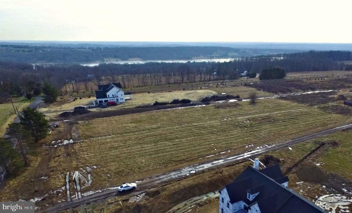 Premium 2 acre lot walking distance to Lake Galena.  This final lot is located in the desirable Vinyard at Peace Valley Community.  An exclusive opportunity to build near the lake.  Build you custom dream home in one of the most beautiful locations near Lake Galena and Peace Valley Park.  Enjoy the  lake life with walking trails, biking, kayaking, paddle boats or picnic watching the beautiful sail boats and sunsets.  Central Bucks School District.  Well is installed already.  Only a short drive to downtown Doylestown.  Incredible location.  Do not park in neighbors driveway or enter property without a confirmed listing appointment.