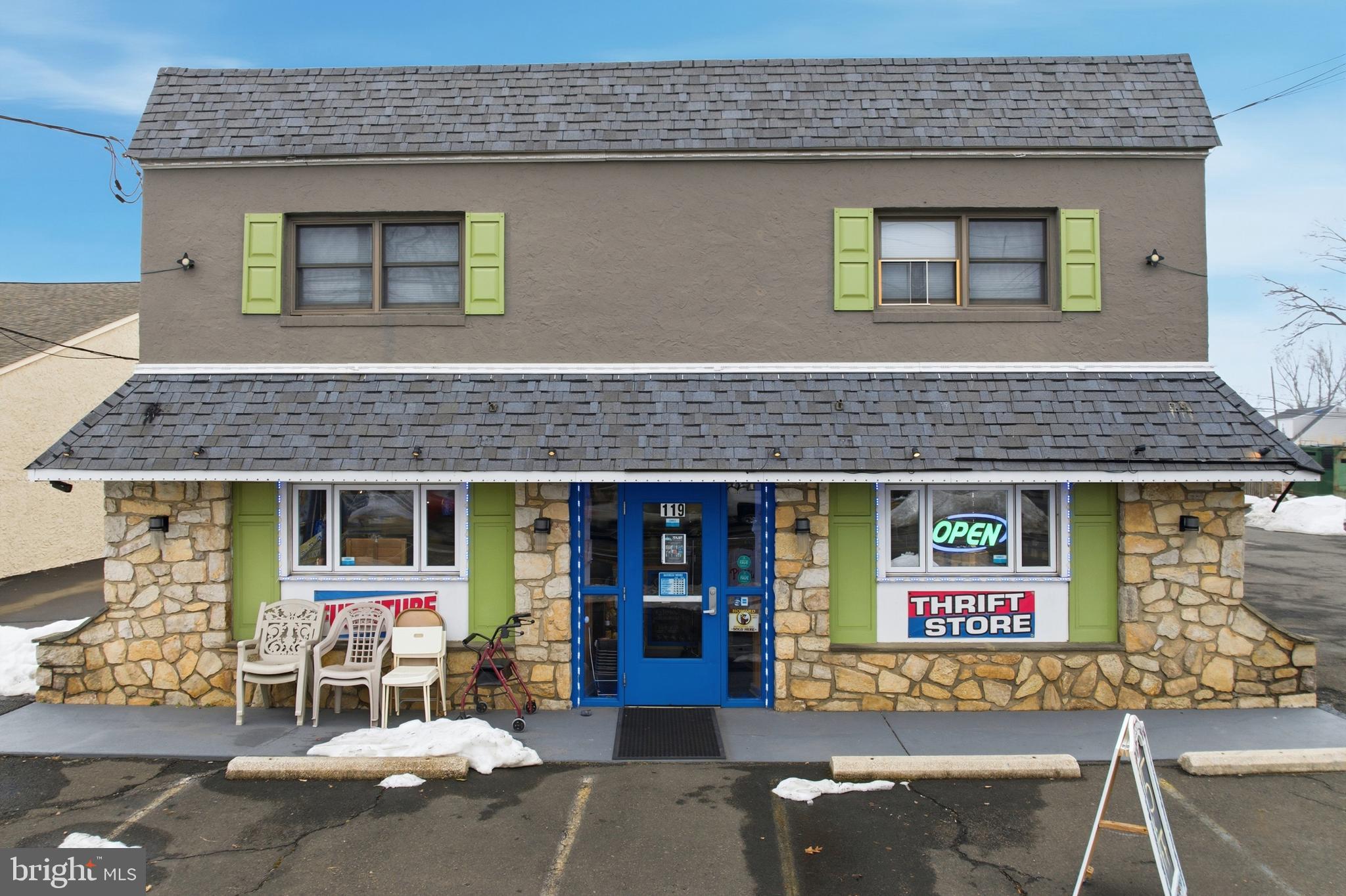 Excellent investment opportunity at 119 York Road featuring a mixed-use commercial property with multiple income streams and future potential. The property includes a second floor residential apartment generating $2,100/month with a lease in place through November 15, 2026. Additional income is produced from the rear parking lot leased to a car dealership at $1,200/month on a month-to-month basis, along with two additional parking spaces rented for $250/month total. The entire lower level is currently occupied by Smart Decor and offers flexible ground level commercial space, including a walk-in refrigerator. The lower level includes three bathrooms, one with a full shower. Utilities feature three electric zones (two commercial, one apartment) and a single water bill servicing the property. Heating is provided by two oil heaters (separate systems for apartment and commercial space) along with two mini-split units for additional climate control. The property also includes a storage shed with electric service, 32 parking spaces, and potential subdivision opportunities (buyer to verify with township). Ideal for investors or owner-users seeking strong cash flow with upside potential.  The property has direct road access and  frontage at the front and rear allowing convenient entry / exit options.  There is a garage door opening at the rear of the building that was converted to a bar, but could be opened up again.