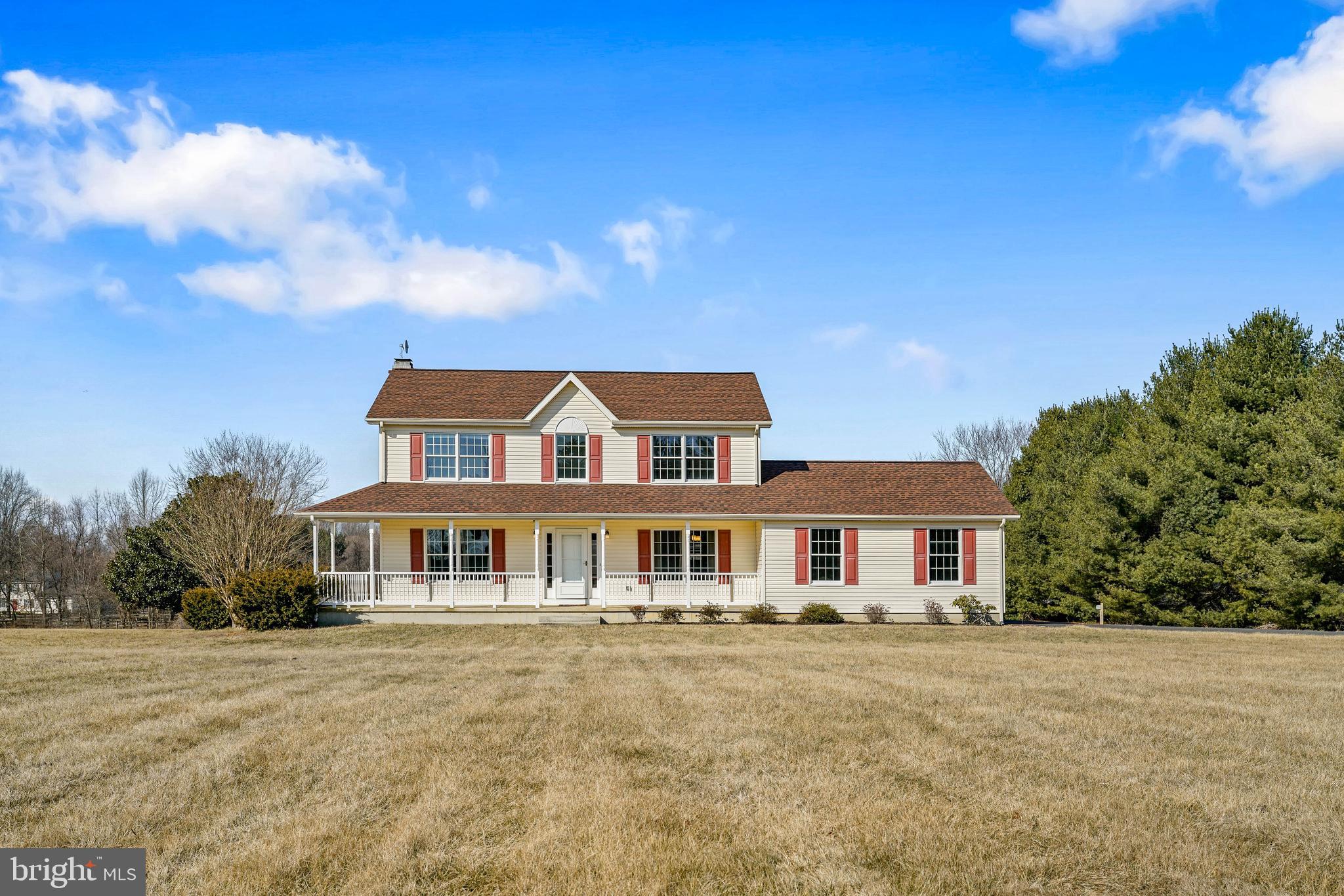 Welcome home to this expansive 2.42 acre lot in the heart of Warwick! As you step inside, this beautifully updated home greets you with fresh paint and gleaming hardwood floors that flow effortlessly through the foyer, a stylish half bath, and a generous dining room, perfect for hosting memorable gatherings. Nestled adjacent to the dining room is a formal living room, perfect for quiet relaxation.  As you make your way to the back of the house, you'll be drawn into the expansive kitchen, a true heart of the home, featuring granite counter tops, an eat-up bar for more casual dining, stainless steel appliances, and a deep farmhouse sink that adds both character and functionality. But that's just the beginning—designed with an open-concept, the kitchen and family room both showcase luxury vinyl flooring, effortlessly flowing into one another to create a cohesive, inviting space. The family room is highlighted by a beautiful brick fireplace, providing the setting for cozy wood-burning fires. As you make your way upstairs, you'll discover the serene primary suite, a true retreat, complete with an en-suite bathroom, a spacious walk-in closet, and a cozy sitting/dressing area. The room is further enhanced by vaulted ceilings that add a sense of openness, along with an abundance of natural light that fills the space. Both the en-suite bathroom and the hall bathroom are thoughtfully updated, featuring luxury vinyl flooring, elegant new vanities, and tub showers. The two additional generously sized bedrooms, along with the primary, boast plush new carpet, adding warmth and comfort to each room. For added convenience, the second-floor laundry offers ease and practicality. The partially finished basement provides an abundance of potential, offering a fantastic space that can easily be transformed into a home theater, game room, gym, or whatever your heart desires. It's a blank canvas ready to bring your vision to life. Additionally, there's a generous utility room with convenient access to the backyard and extra storage options. Just off the back of the house, a sliding door opens to a generous tiered deck, ideal for outdoor dining, relaxing, or entertaining. Beyond the deck, you'll find a fenced yard, suited for children to play or pets to roam freely. The rest of the expansive lot remains open, offering endless possibilities for your personal touch. The lot also includes an electric supply hookup for an RV located just off the end of the newly paved driveway. Located just 10 minutes from Middletown, DE, this home offers the perfect balance of convenience and seclusion, with easy access to shops, restaurants, and more, all while enjoying the peacefulness of rural living. This great listing won't last long. Call today to schedule your private tour.