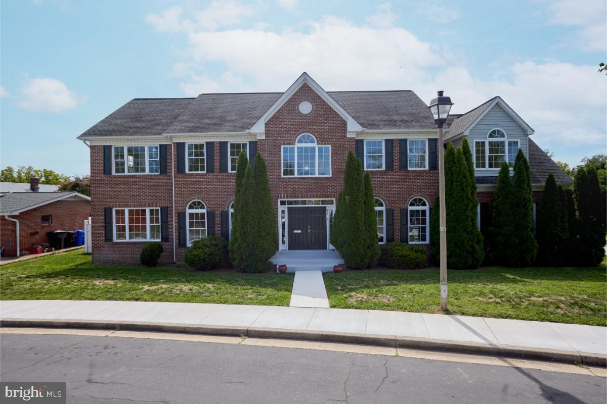 Elegant one of a kind all brick center hall colonial built for comfort and privacy with elevator to all levels. Just painted and move-in ready. This 2009 house offers 6,425 square feet, seven bedrooms with their bathrooms, a laundry and a kitchen or kitchenette on every floor! The bright first floor showcases a two-story foyer and a grand curved hardwood staircase, crown moldings, wainscoting, chair rail, hardwood floors, the owner’s bedroom and bathroom conveniently located next to a nice office centered by a slate gas fireplace and big windows. There you will also find a formal living room, and dining room with beautiful arched and tall windows, with access to a good size kitchen open to the family room that takes you to a deck towards the side stone fenced terrace. There is also an au pair suite with a private full bath, access to the terrace and a large two-car garage. 

The gourmet kitchen features beautiful granite countertops with peninsula, pendant lamps, hardwood cabinets, recessed lights, stainless steel appliances and wine fridge. 

Upstairs are four-bedroom suites with private full bathrooms, three with den/ study/office/sitting areas, a common room, a kitchenette and laundry. 

The lower level features a great exercise area with wall-to-wall carpet, a great tiled recreation room with outdoor access, a bright white kitchenette with washer and dryer,  a bedroom and a den, that is a potential bedroom with two full bathrooms. 

Phenomenal location, minutes to the Pentagon, Reagan National Airport, I-395, shopping, restaurants, Amazon HQ 2 and downtown DC attractions. Close to school and bus stop. Nearby playground/park. It is a great home to suit the needs for many people, low maintenance lot/back patio.