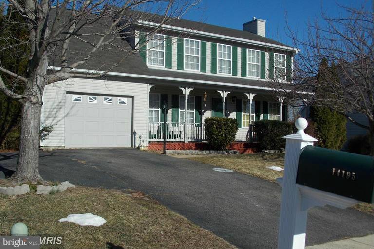 BRAND NEW HEATING & A/C UNIT INSTALLED IN AUGUST 2014. Beautiful renovated home with fenced in back yard and 2 level deck. SS appliances, granite counters, cherry cabinets, hardwood throughout man in level and stairs, crown molding, chair rail, new carpet . Luxury Mstr. Bdrm Suite with large sitting rm. Additional room in LL for office or 4th bdrm.