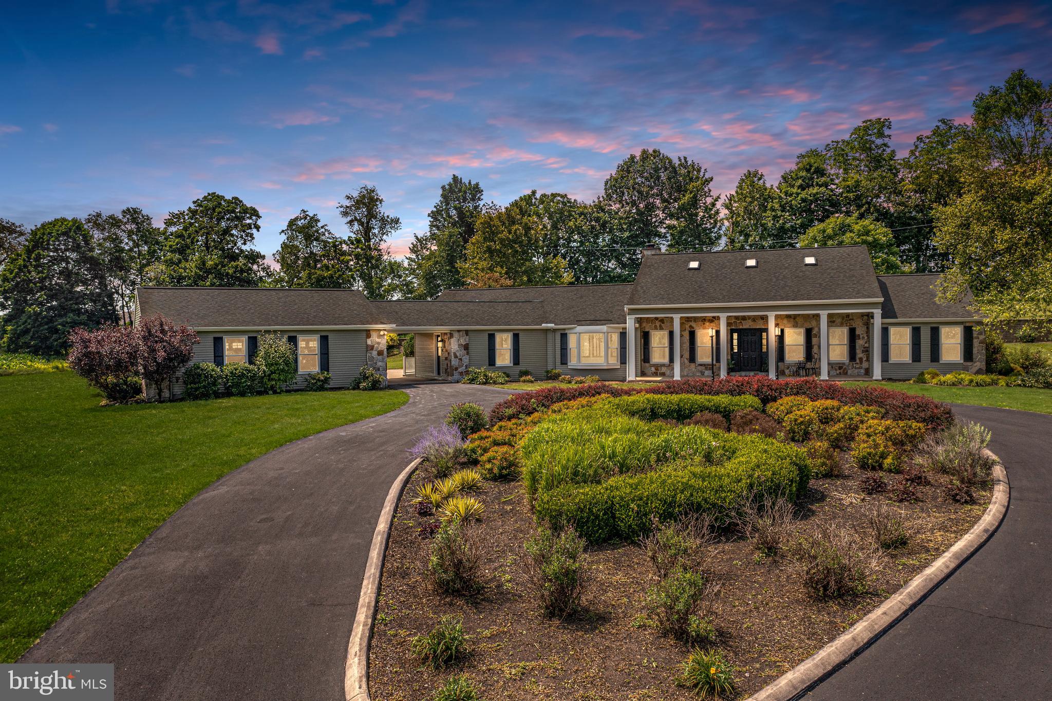 Discover the ultimate retreat, where modern luxury harmoniously blends with tranquil privacy on this expansive property spanning over 34 acres. A picturesque haven awaits as you journey down the private drive, artfully curving around a glistening pond, leading you to a magnificent home graced with a circular driveway and an accommodating 3-car garage. Embrace the beauty of nature and serenity on the grounds, with captivating views of the surrounding landscape and the serene pond. Adding to the allure, two meticulously finished Morton outbuildings stand proudly on the estate. The larger structure is thoughtfully equipped with both air conditioning and heating, while the second outbuilding, complete with a bathroom, offers versatility and convenience for various uses. Whether you desire to store your large vehicles, boats, motorhomes, or embark on exciting projects, these outbuildings provide endless possibilities for your lifestyle needs. As a testament to seamless ownership, the two parcels of land have been thoughtfully consolidated into one deed, encircled by the enchanting embrace of majestic trees. Both parcels have been thoughtfully enrolled in clean and green programs, further preserving the natural beauty and tranquility of the surroundings. This unique offering ensures that you can fully immerse yourself in the captivating beauty of nature while enjoying the conveniences of modern living. Step inside the exquisite home to revel in over 5700 square feet of tastefully finished living space. An inviting entrance opens up to a grand living room, adorned with a magnificent two-sided stone fireplace that effortlessly creates a warm and inviting ambiance. The fireplace serves as a centerpiece, also gracing the adjoining family room, fostering an atmosphere perfect for cherished moments with family and friends. Indulge your culinary aspirations in the recently renovated kitchen, a haven for both seasoned chefs and culinary enthusiasts alike. The ample space invites gatherings and celebrations, ensuring that every meal becomes a memorable occasion. Retreating to the private quarters, you'll find four spacious bedrooms, each providing an oasis of comfort and tranquility. With 5.5 baths thoughtfully positioned throughout the home, convenience and luxury seamlessly intertwine. The second-floor master suite has been recently expanded, offering a private sanctuary that boasts an exquisite en-suite bath. Here, relaxation and rejuvenation become a daily indulgence. Adding to the allure, the finished basement provides a vast family room with a convenient wet bar, ideal for entertaining guests or enjoying cherished family time. Ample storage space within the basement ensures that belongings remain neatly organized and easily accessible. Stepping outside, the rear of the home unveils a captivating fenced-in pool, complete with an electronic cover and heater. Whether basking in the warm sun or cooling off in the pool's refreshing waters, this outdoor oasis is the epitome of relaxation and bliss.  A residence of this caliber demands an exclusive viewing, and as such, showings are exclusively available to pre-approved buyers. Do not let this extraordinary opportunity pass you by; seize the chance to make this exceptional property your own and embark on a new chapter of unparalleled luxury living amidst nature's embrace. Preapproved buyers only.