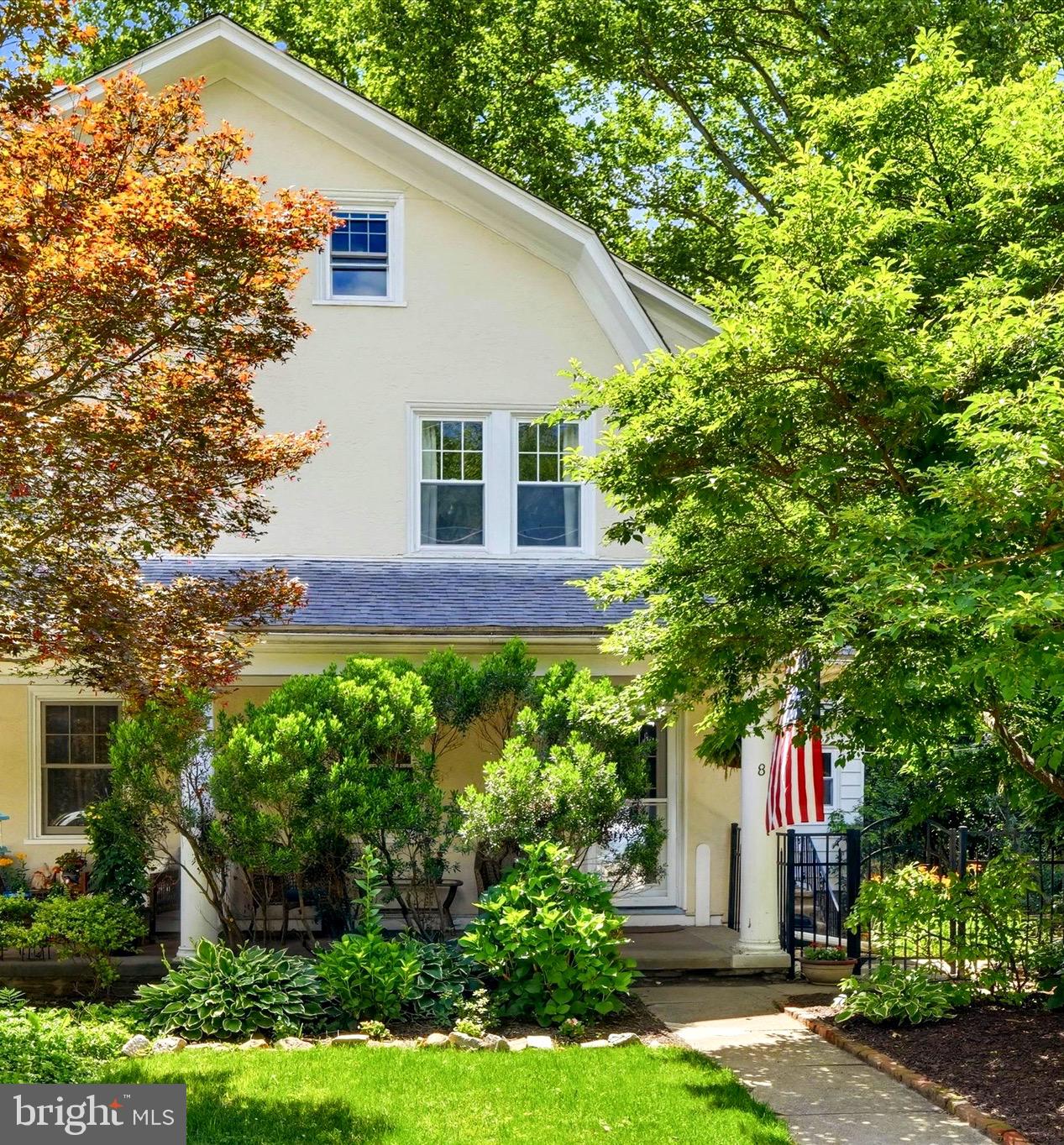 Welcome to 8 Hewett Road, a meticulously maintained and thoughtfully updated 3-bedroom, 2.5-bath home nestled on a picturesque tree-lined street in the heart of Old Wyncote. Filled with natural light and rich in character, this special property offers multiple flexible living spaces, a finished walk-out lower level currently utilized as a private guest suite, two separate garage spaces with endless possibilities, and a fully fenced backyard that feels like a private oasis—all within walking distance of the park and train station.

A welcoming front porch leads into a gracious living room featuring hardwood floors, custom built-ins, and a wood-burning fireplace. The dining room seamlessly flows into both the renovated kitchen and bright family room, creating an inviting layout ideal for everyday living and entertaining.

The beautifully updated kitchen features new flooring, lighting, appliances, new cabinetry that provides generous storage, and coffee bar. Upstairs, three spacious bedrooms are complemented by a versatile third-floor bonus space perfect for a home office, playroom, or potential fourth bedroom.

The finished walk-out lower level offers exceptional flexibility with a full bath, laundry area, and direct access to two separate garage spaces, ideal for a gym, workshop, storage or future customization .

Outside, the fully fenced backyard offers a peaceful retreat with mature landscaping, expansive green space, and a beautifully reconstructed flagstone side patio—perfect for outdoor dining and entertaining.

Combining timeless charm, thoughtful updates, abundant natural light, flexible living spaces, and a walkable location to the train and parks, 8 Hewett Road offers a rare opportunity to enjoy the very best of Old Wyncote living.